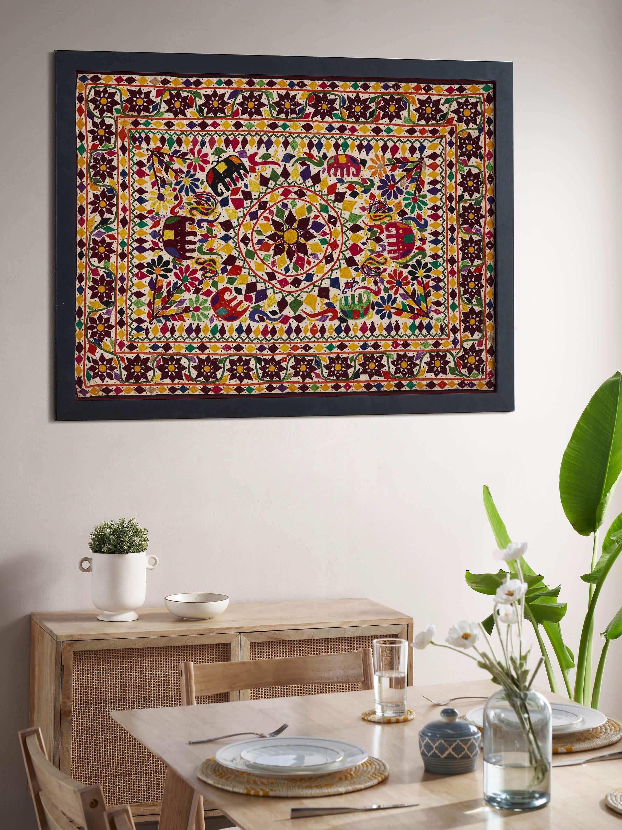 Close-up view of Kutch Embroidery Flowers & Animals Wall Hanging, showing the detailed stitching and colorful patterns