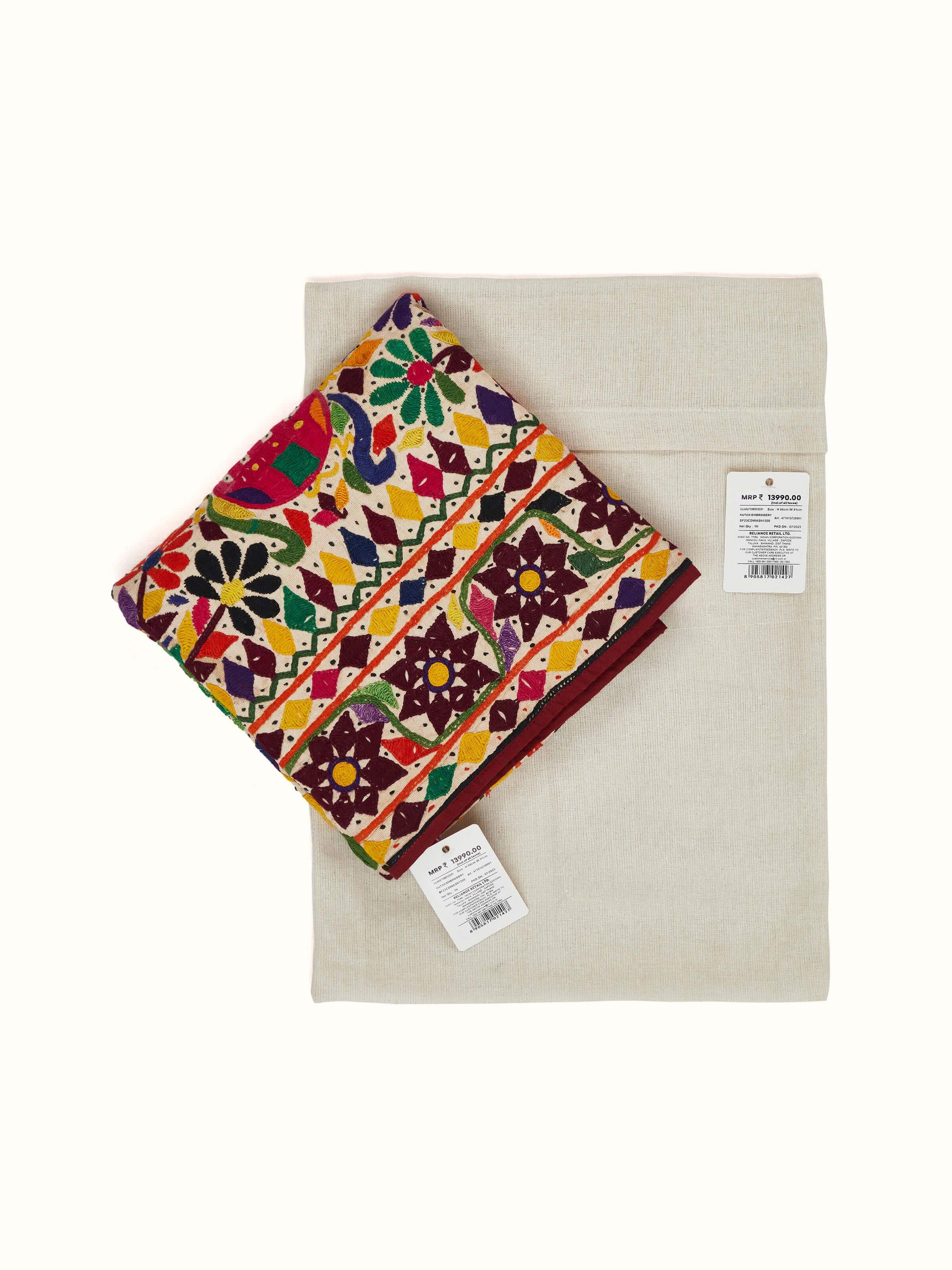 Angled view of Kutch Embroidery Flowers & Animals Wall Hanging, emphasizing the design and craftsmanship of the wall art