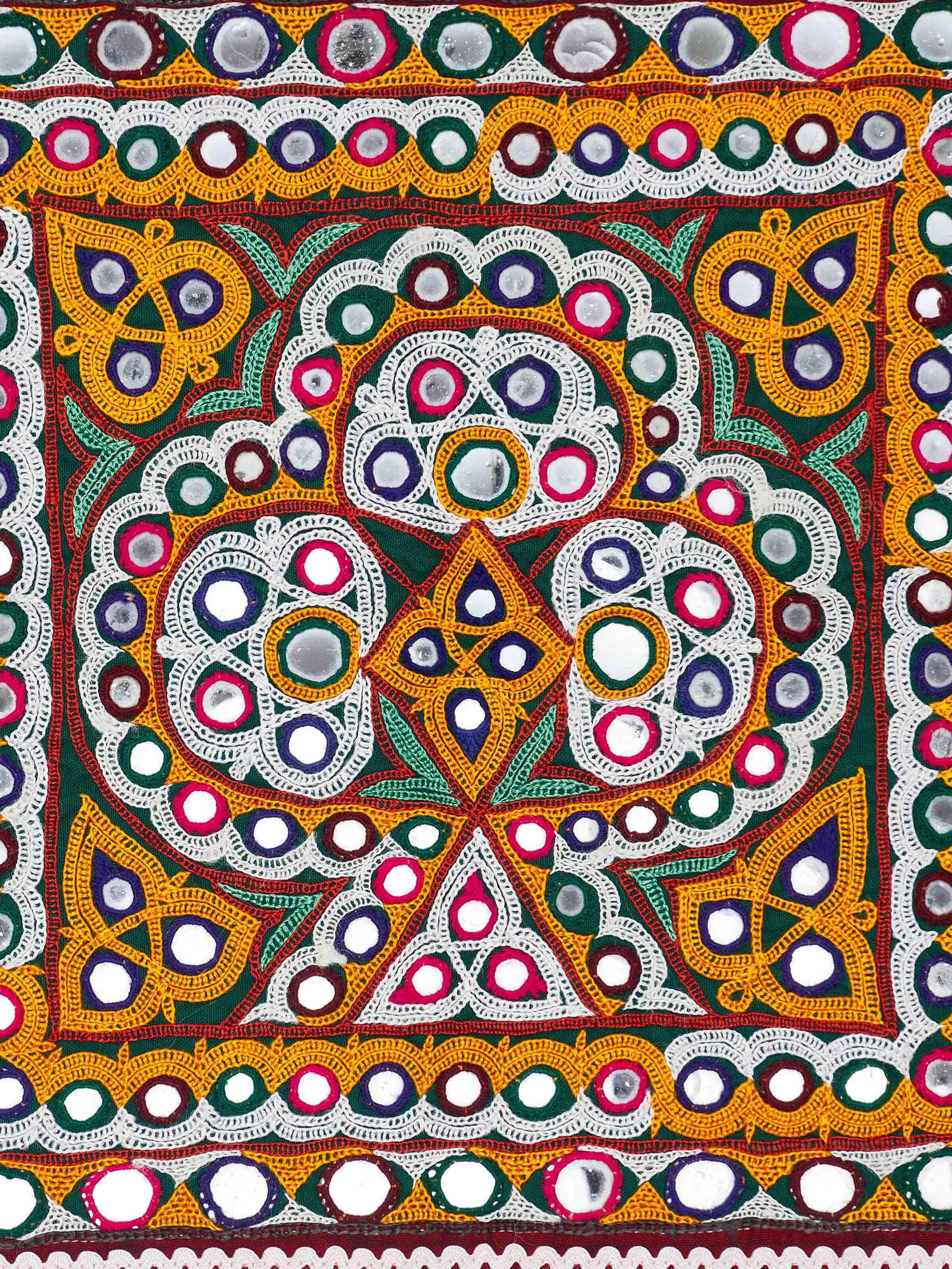 Close-up view of Kutch Embroidery Trees & Flowers Wall Hanging from Swadesh, emphasizing the detailed embroidery work and vibrant colors.