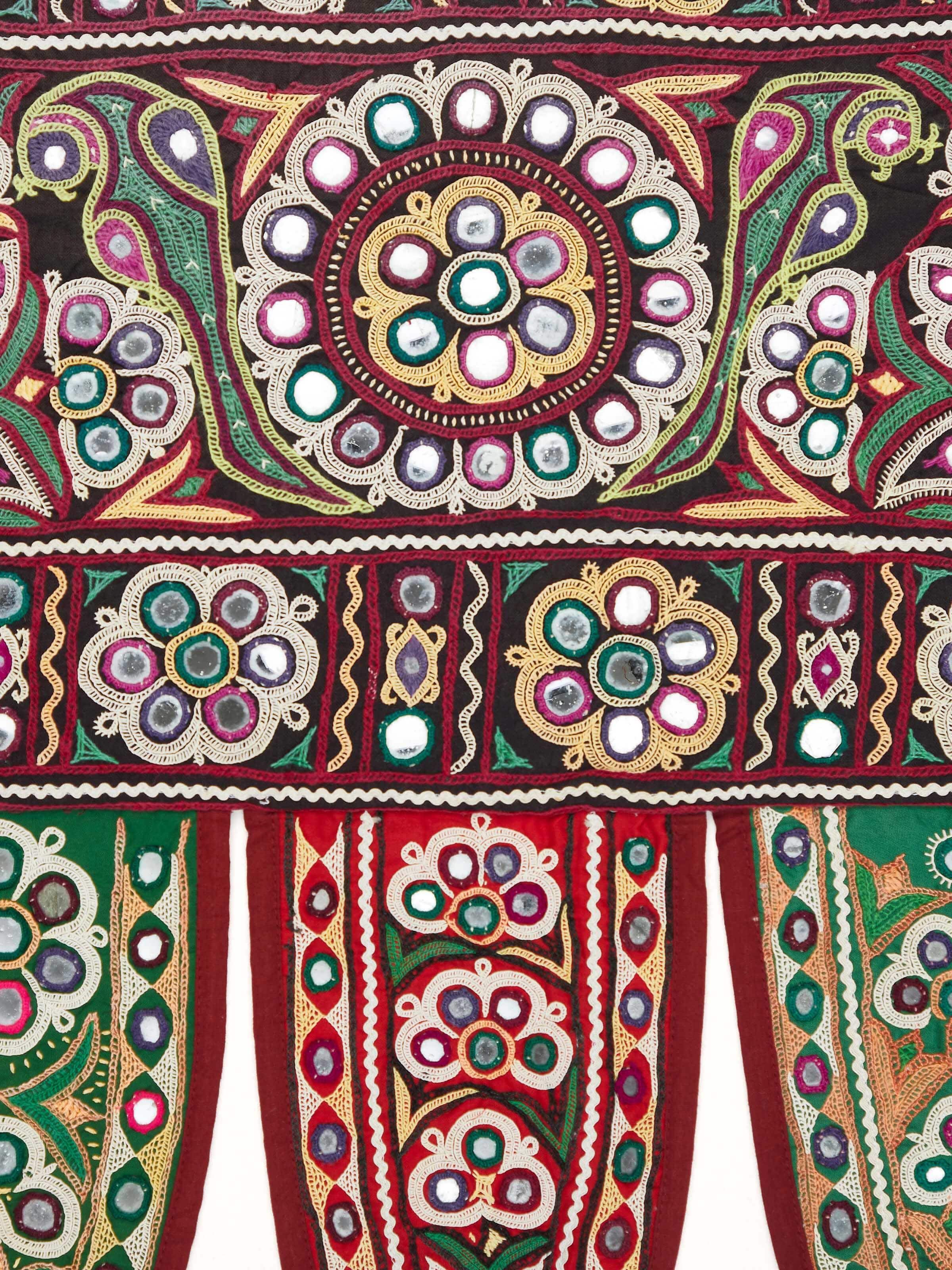 Close-up of Kutch Embroidery Floral Toran focusing on the intricate floral embroidery and vibrant colors.