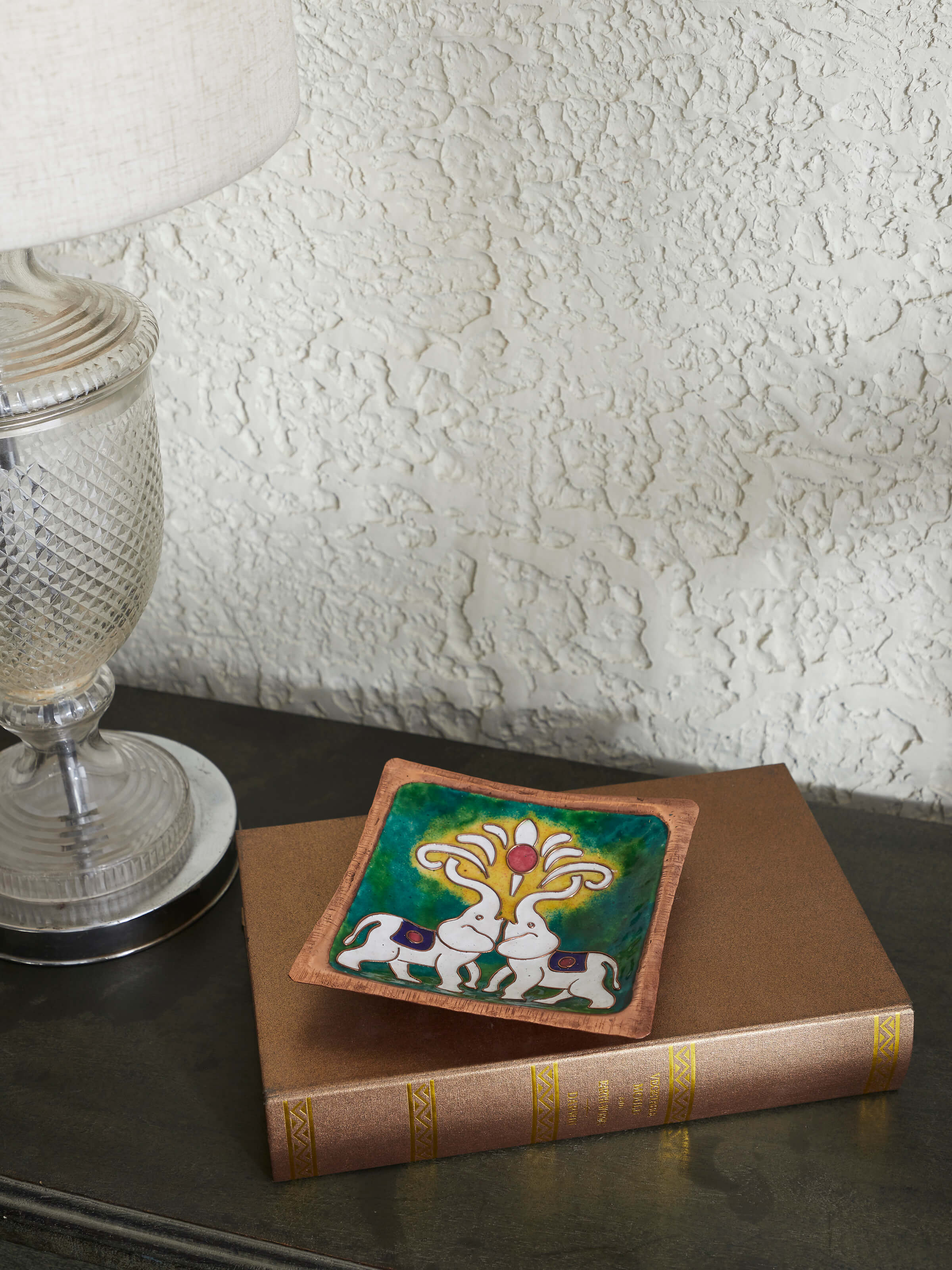 Close-up view of copper tray showcasing its smooth, shiny surface.