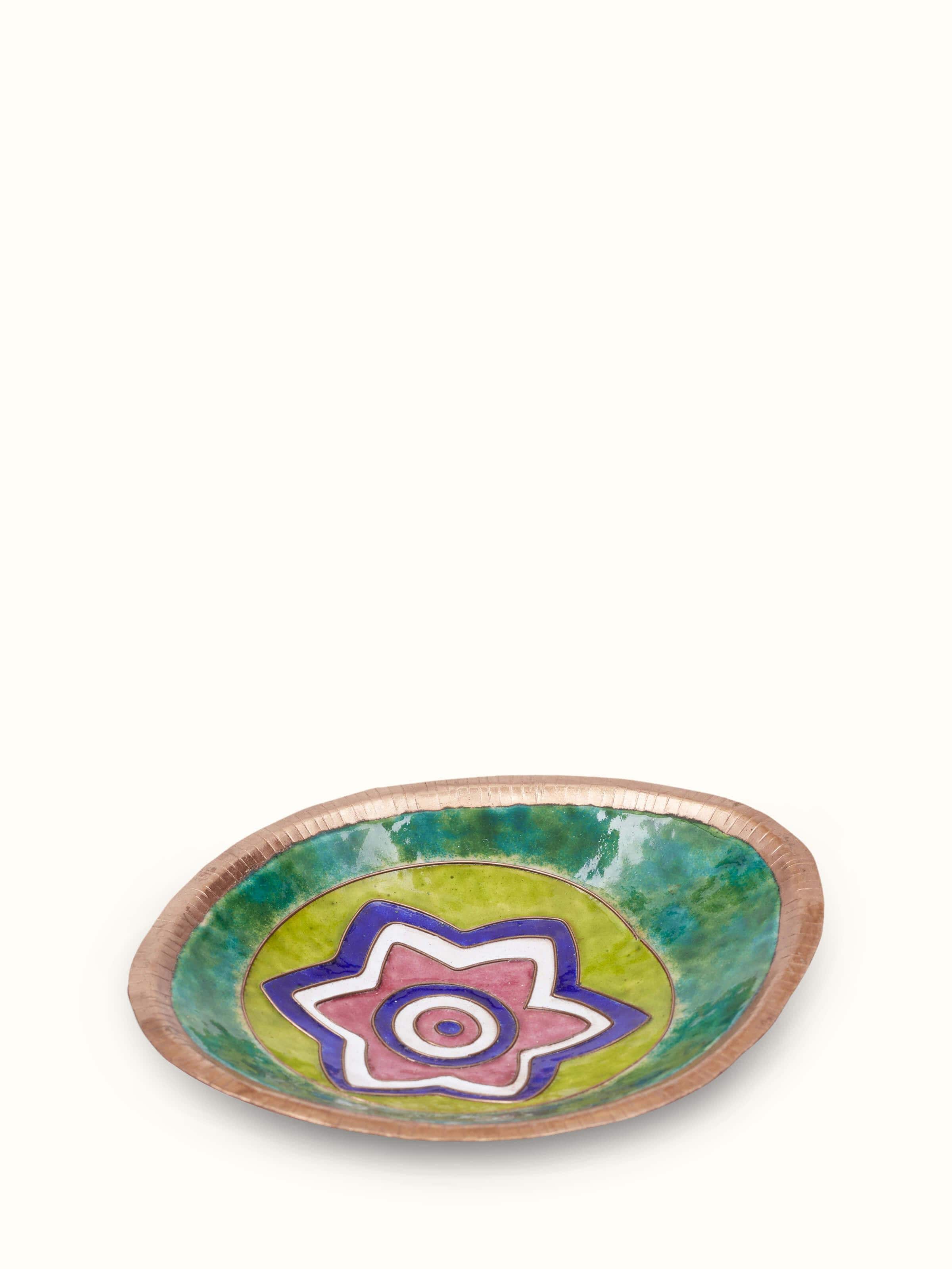 Side view of copper nut bowl displaying rich texture and shine