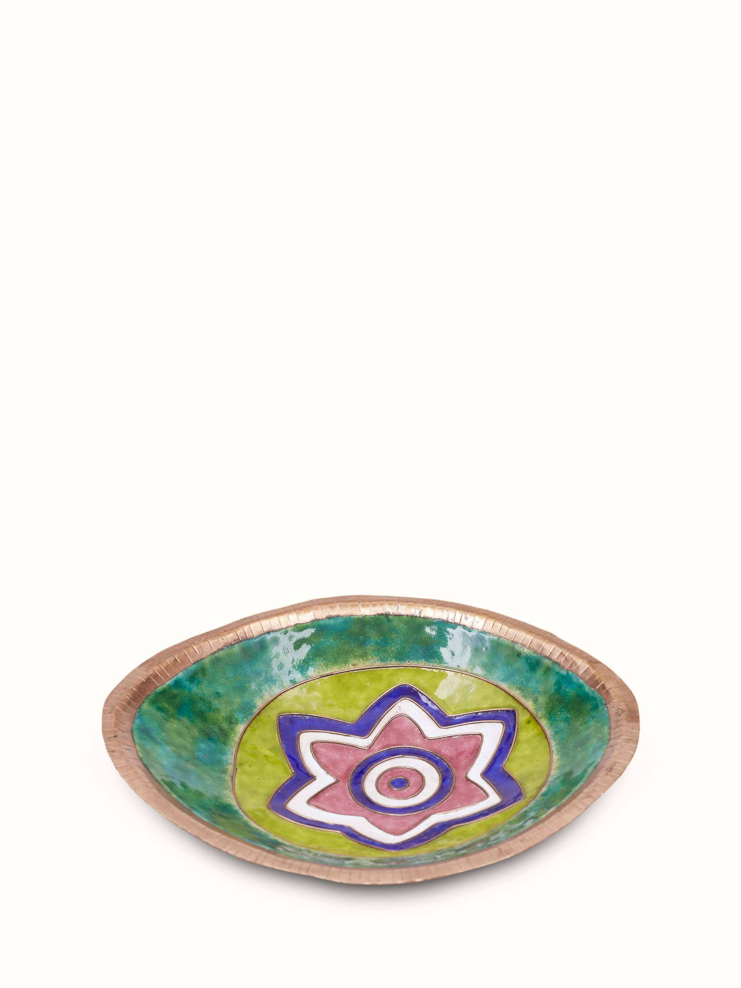 Top view of copper nut bowl highlighting its elegant shape