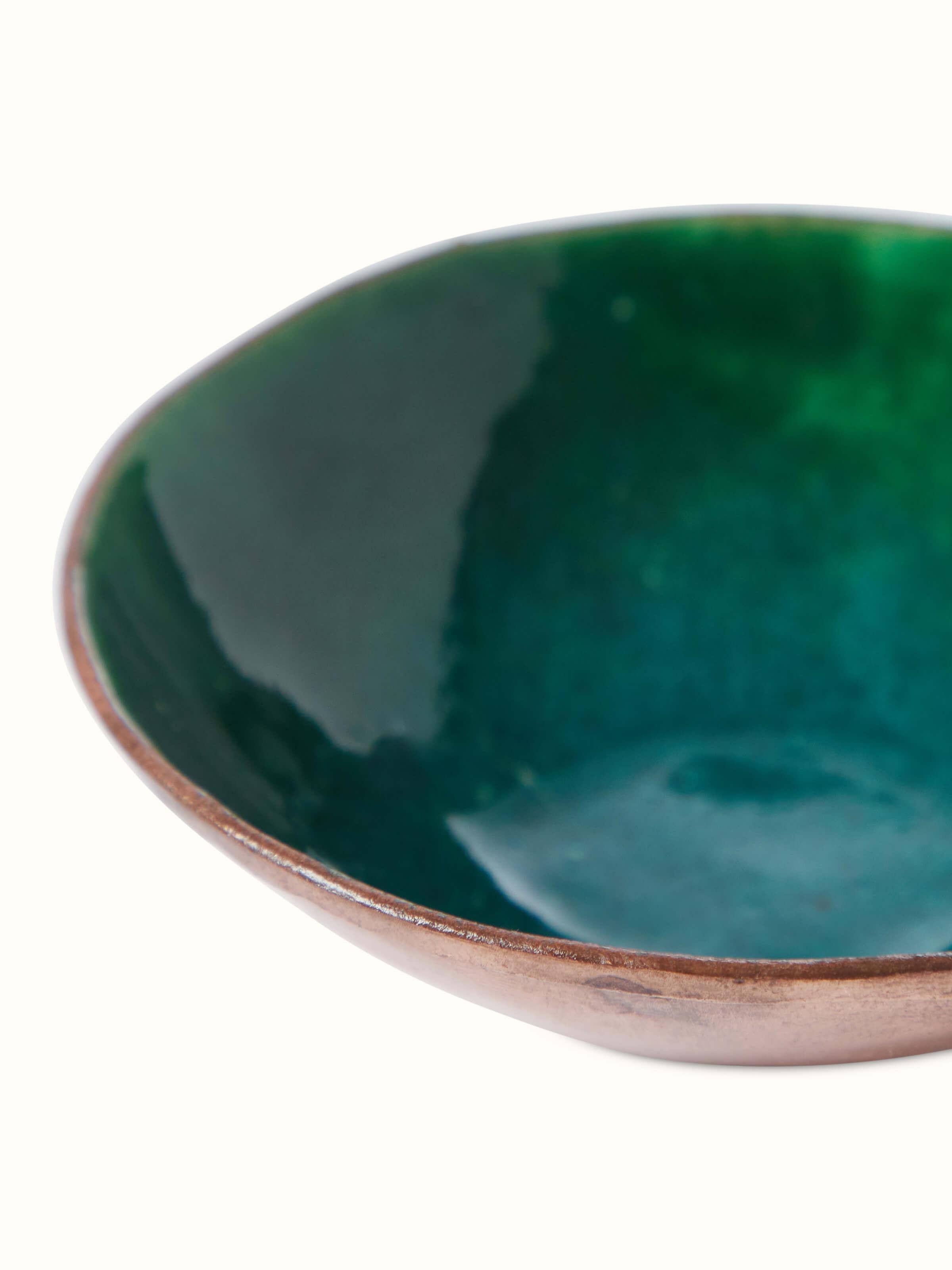 Angled view of Copper nut bowl (6 inches) showcasing its elegant curves and design