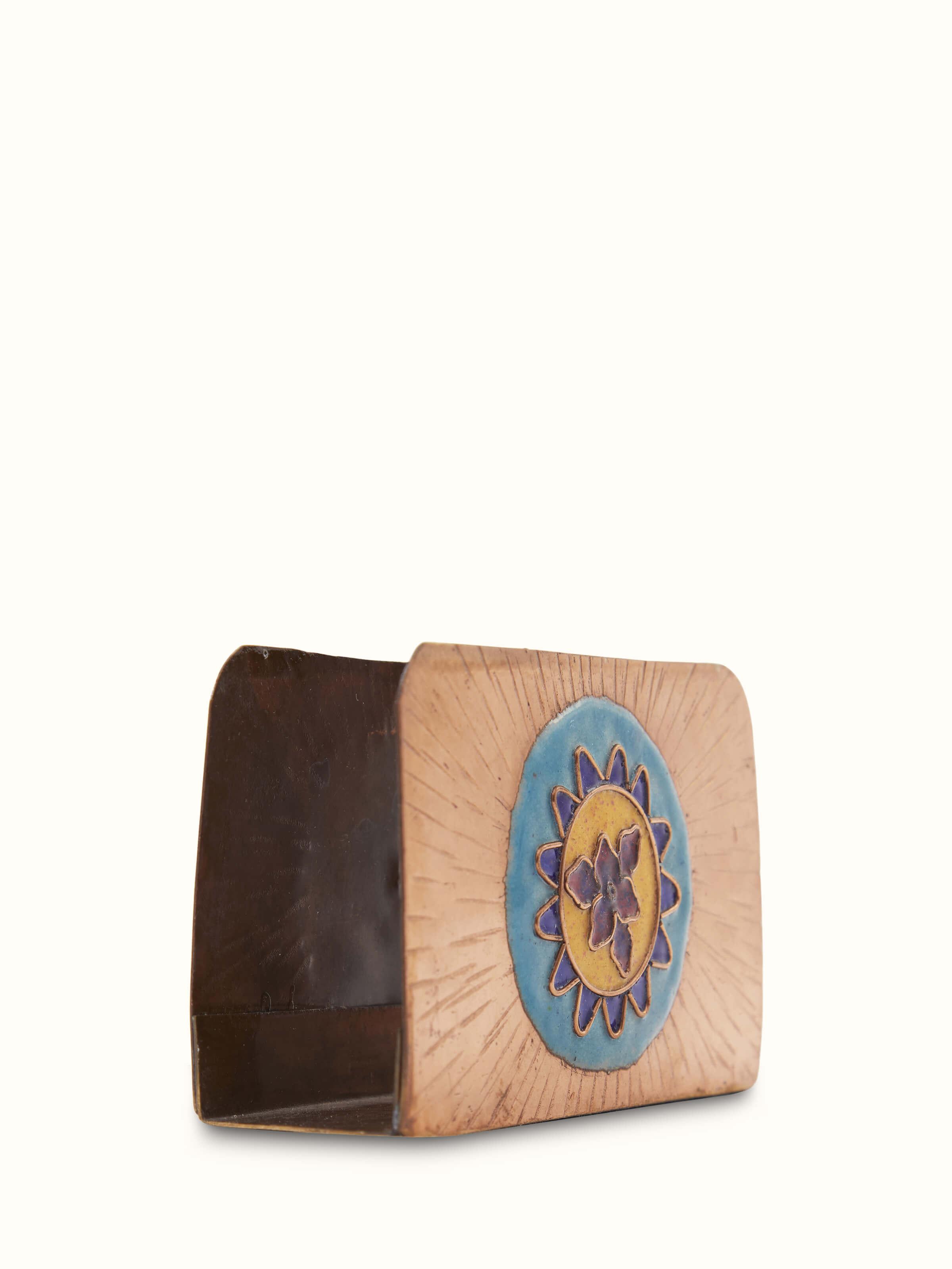 Side view of copper sunshine square card holder in blue, emphasizing the metallic finish