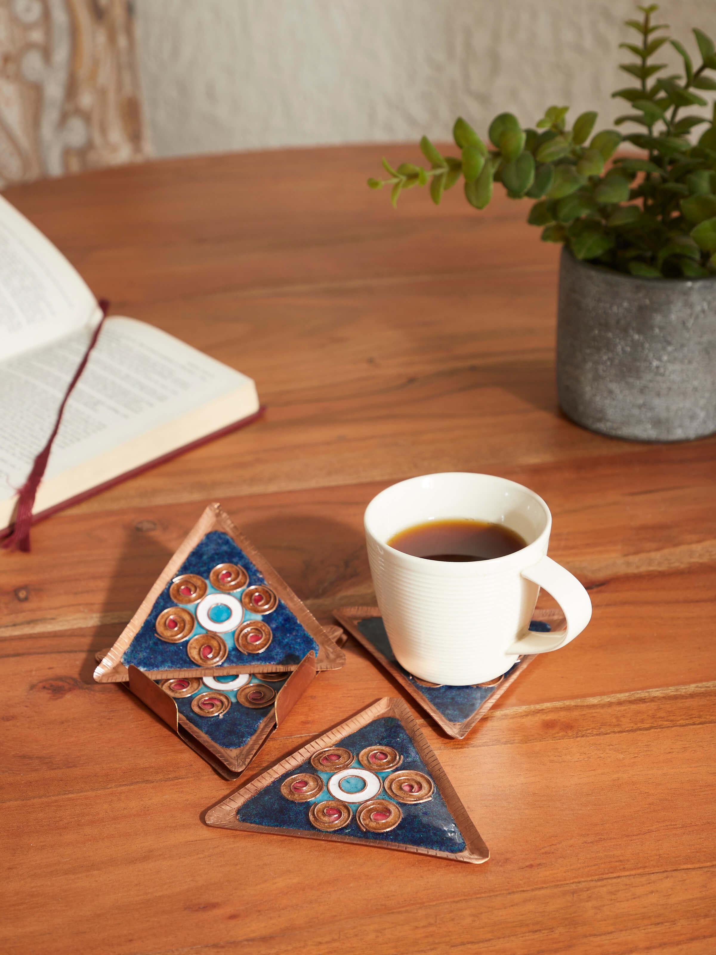 Side view of Triangular copper coaster emphasizing its unique shape
