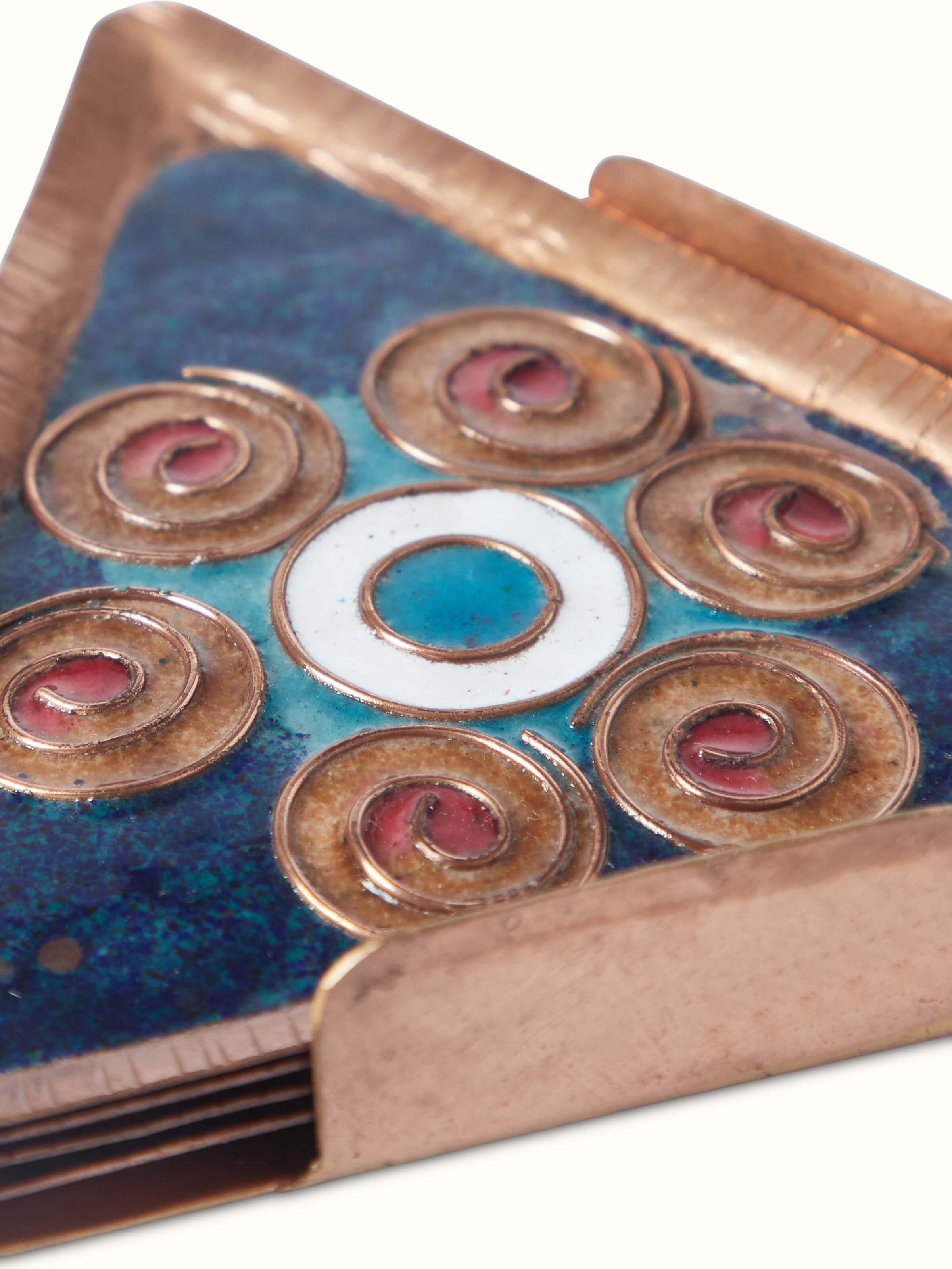 Angled view of Triangular copper coaster highlighting its craftsmanship