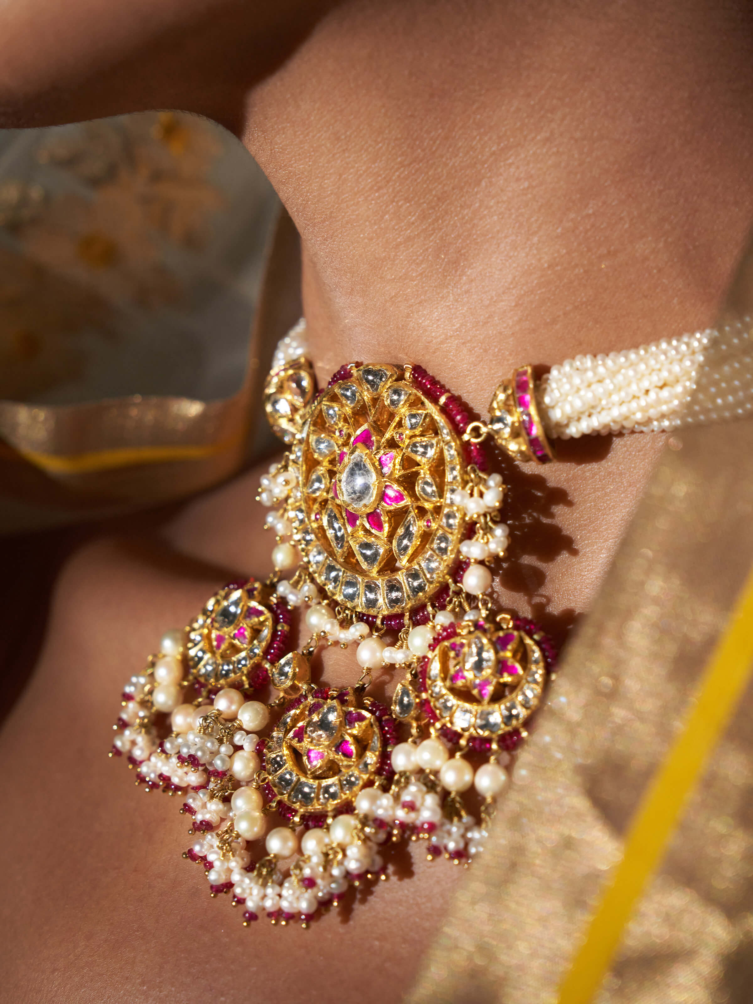 Angled view of Jadau 18 Karat Gold Choker emphasizing the exquisite Jadau work and gold finish.