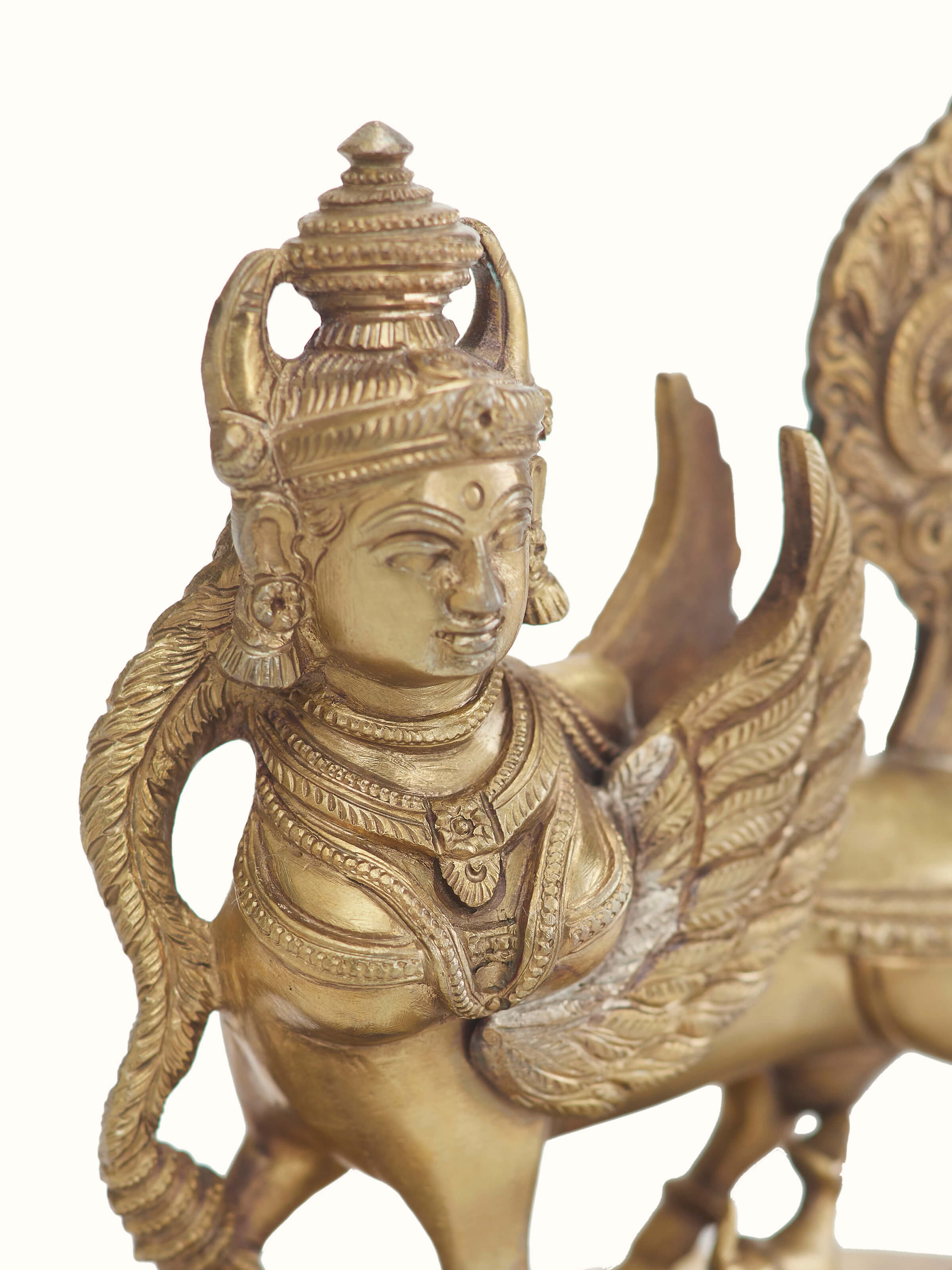 Side view of Kamadhenu bronze casting idol with detailed artistry