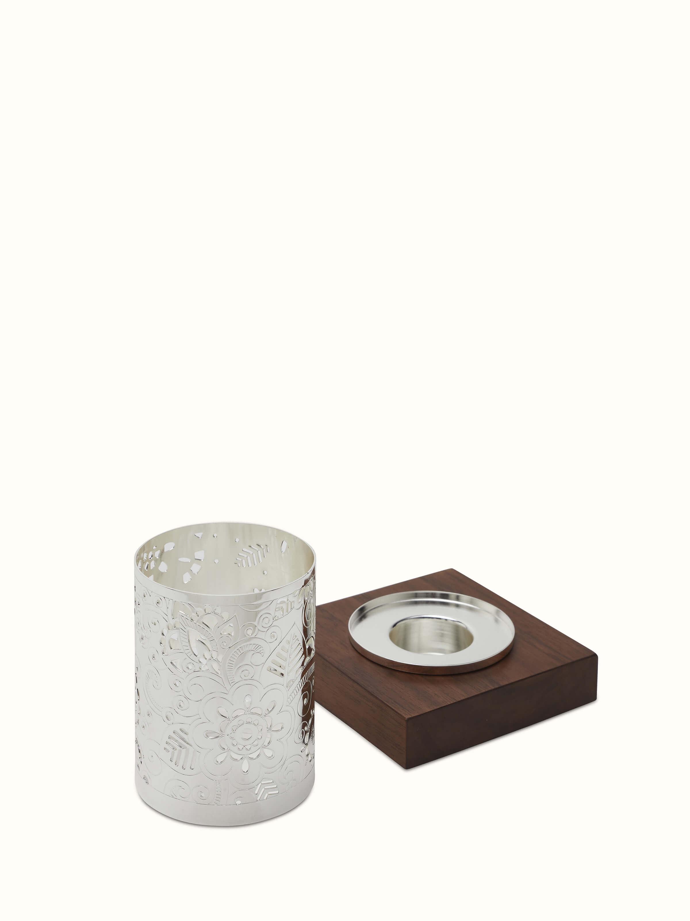 Front view of Silver-Plated Round Paisley Tea Light Holder with intricate pattern.