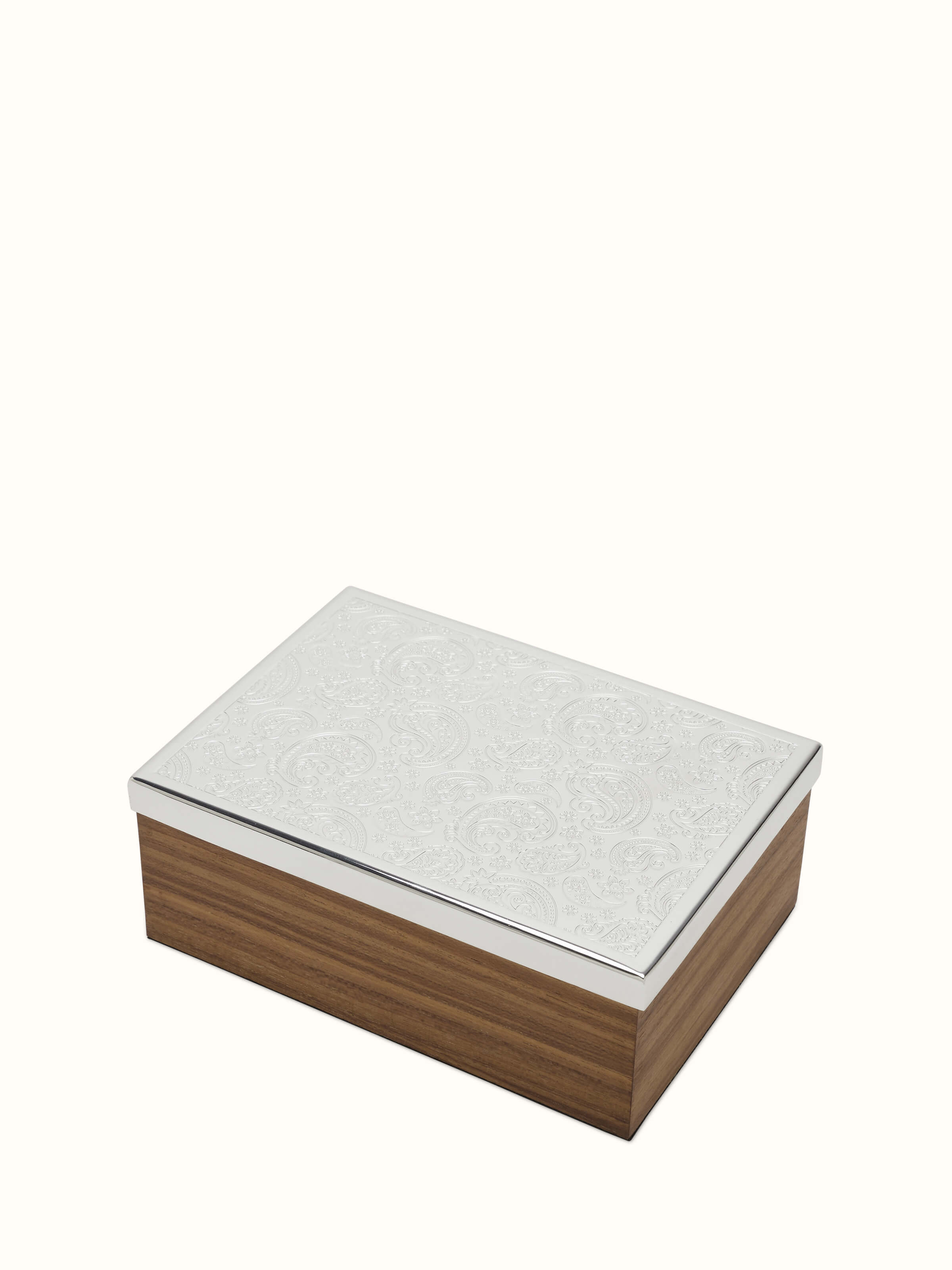 Angle view of silver-plated paisley rectangular box showcasing ornate design