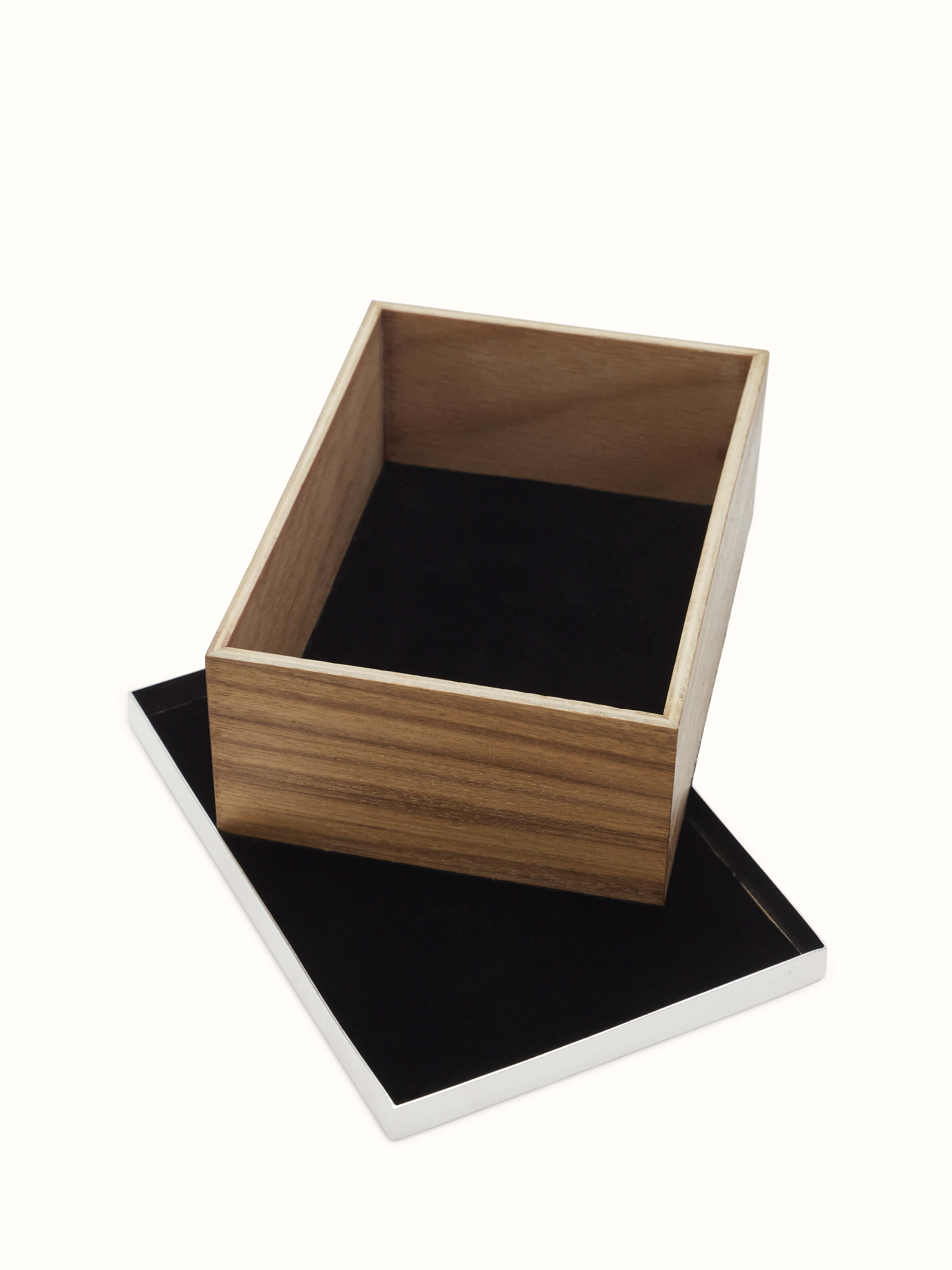 Close-up of silver-plated paisley rectangular box showing detailed craftsmanship