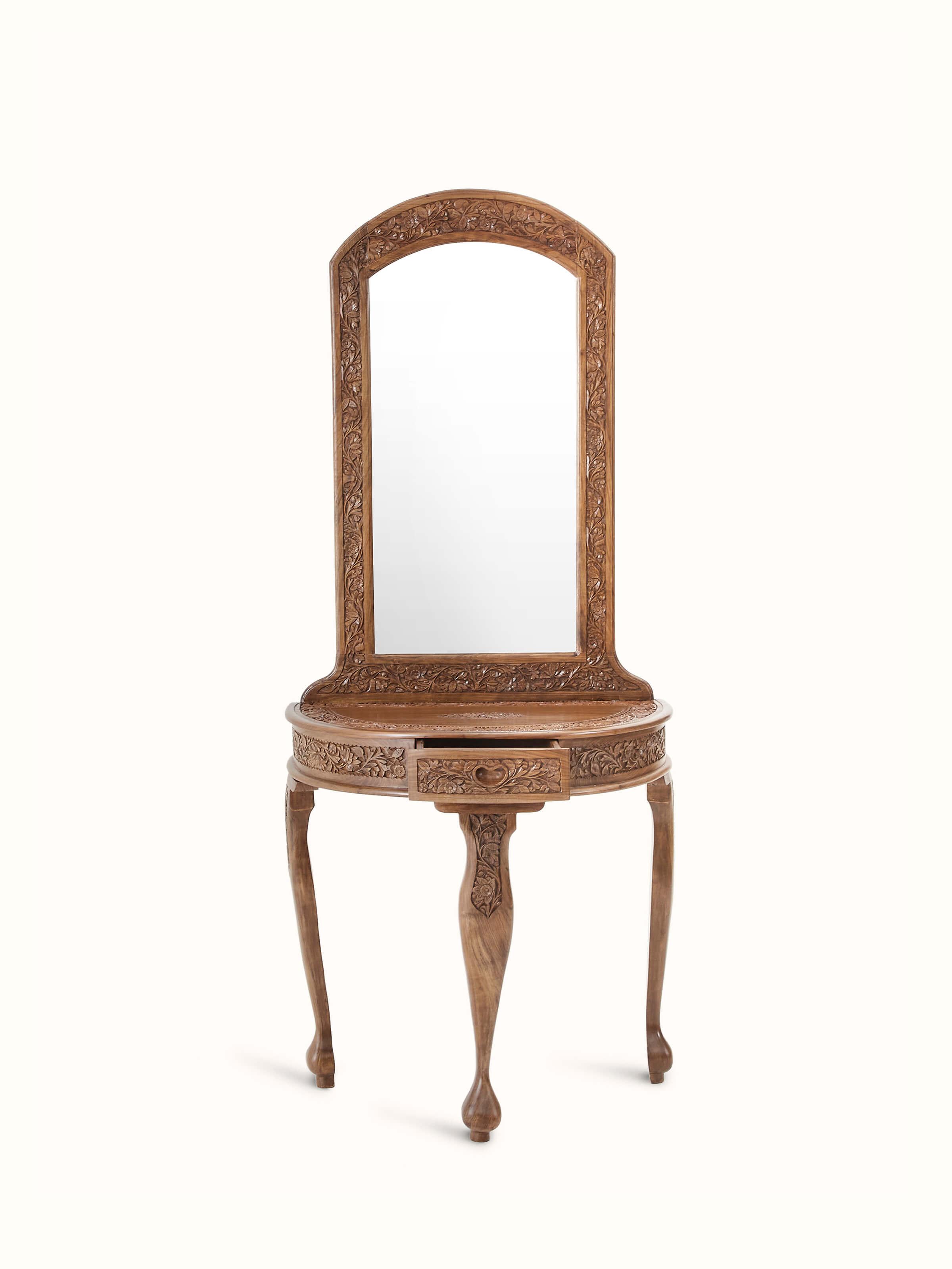 Top view of the carved walnut wood and glass dressing table, featuring the intricate carvings and glass top
