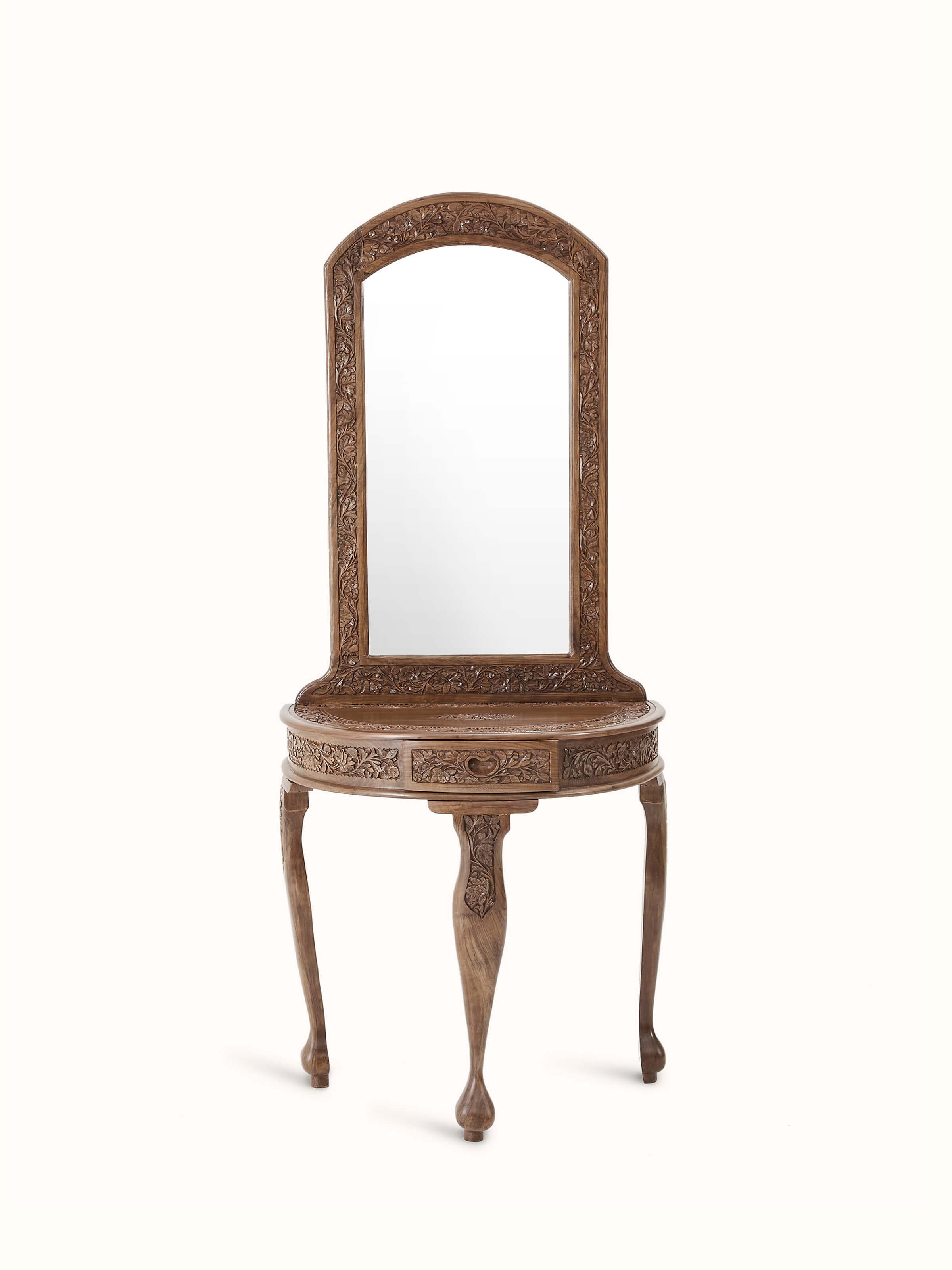 Front view of the carved walnut wood and glass dressing table, showcasing intricate carvings and elegant design