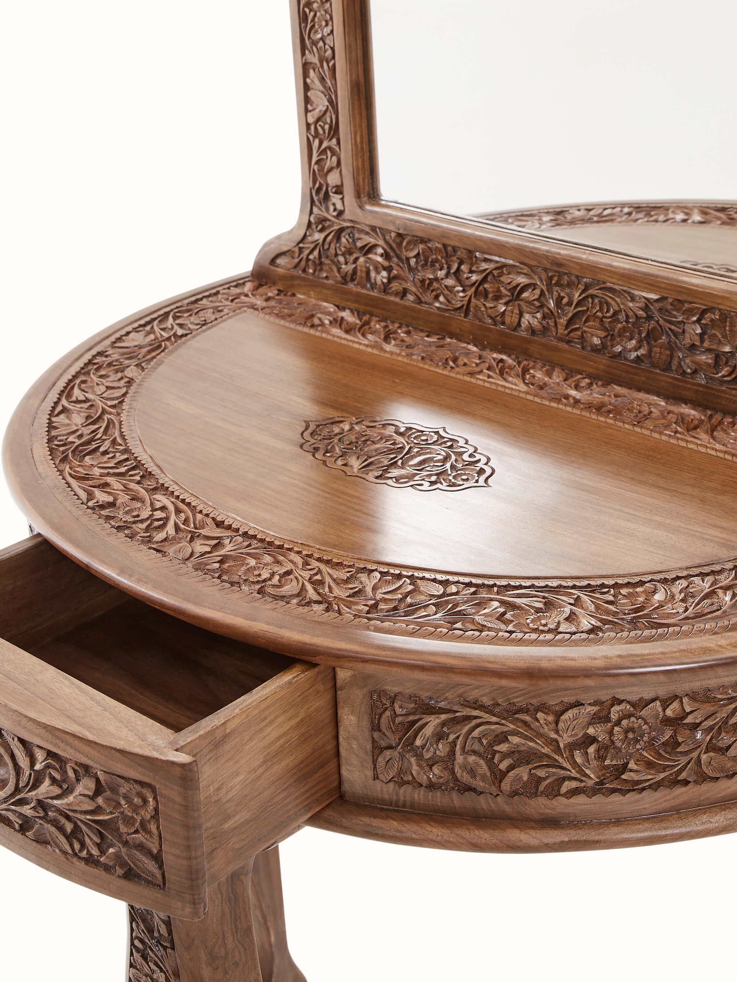 Full view of the carved walnut wood and glass dressing table, highlighting its elegant and functional design