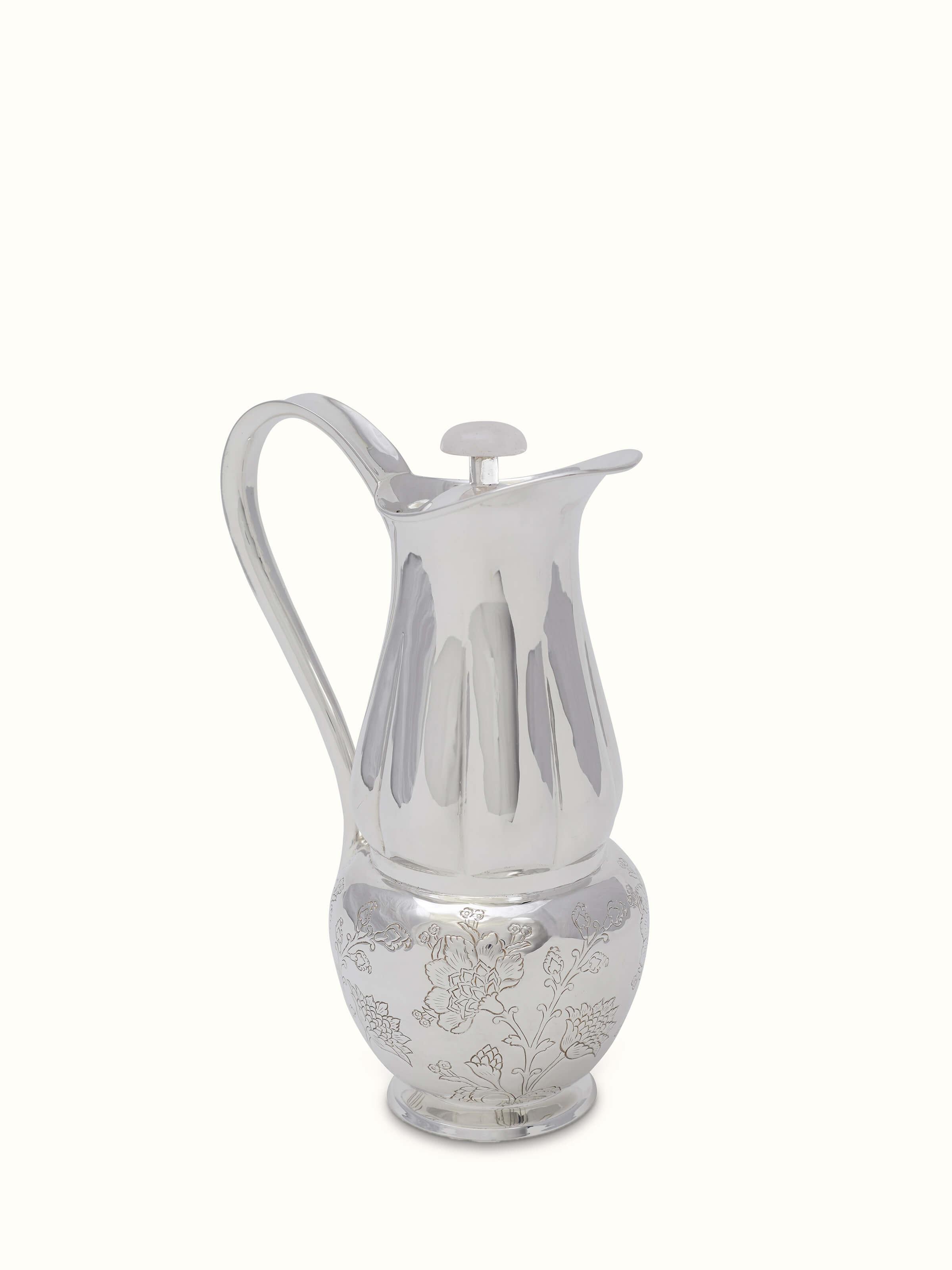 Another side view of Kalamkari silver water pitcher focusing on the intricate design.