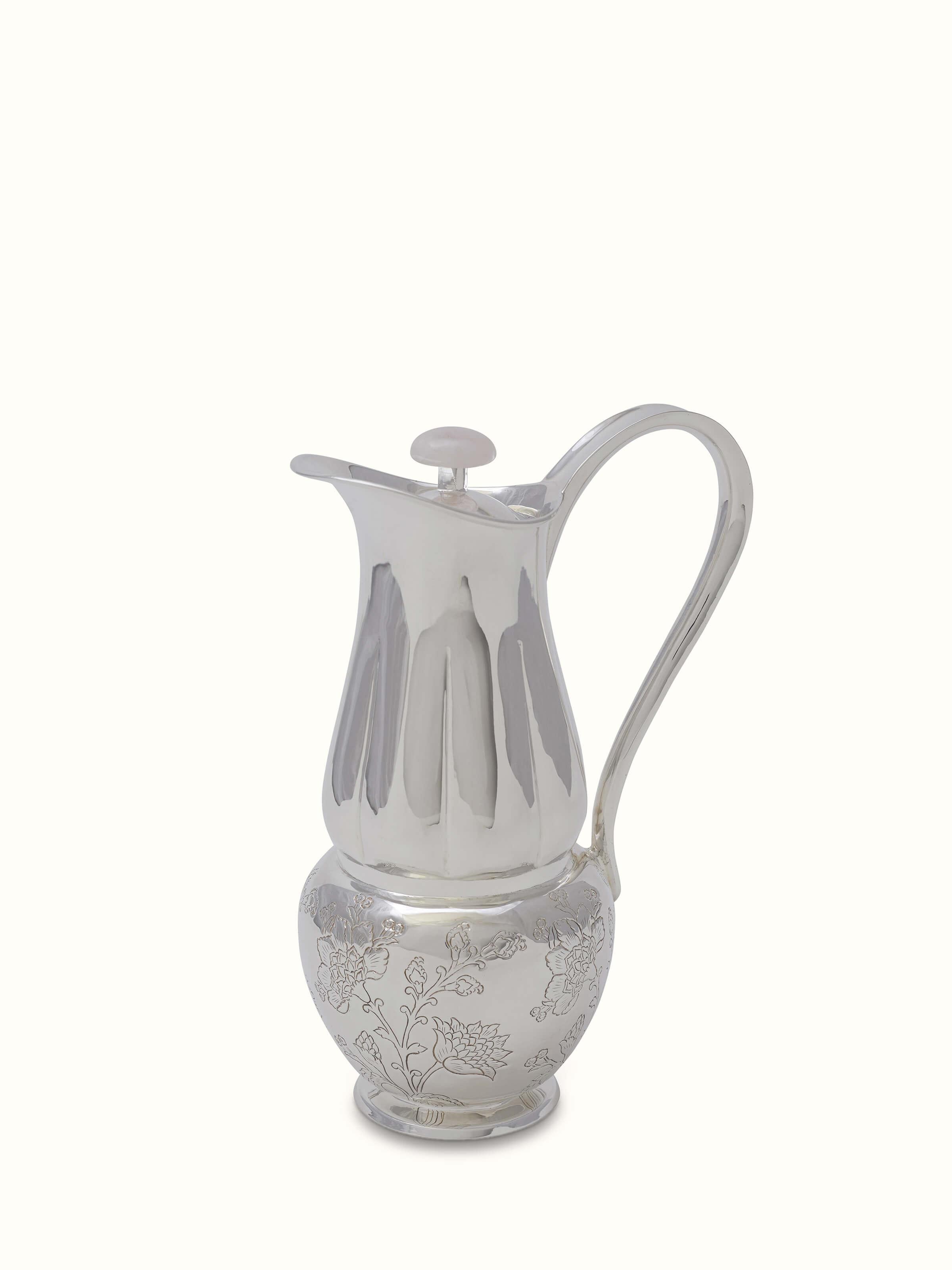 Back view of Kalamkari silver water pitcher emphasizing its craftsmanship.