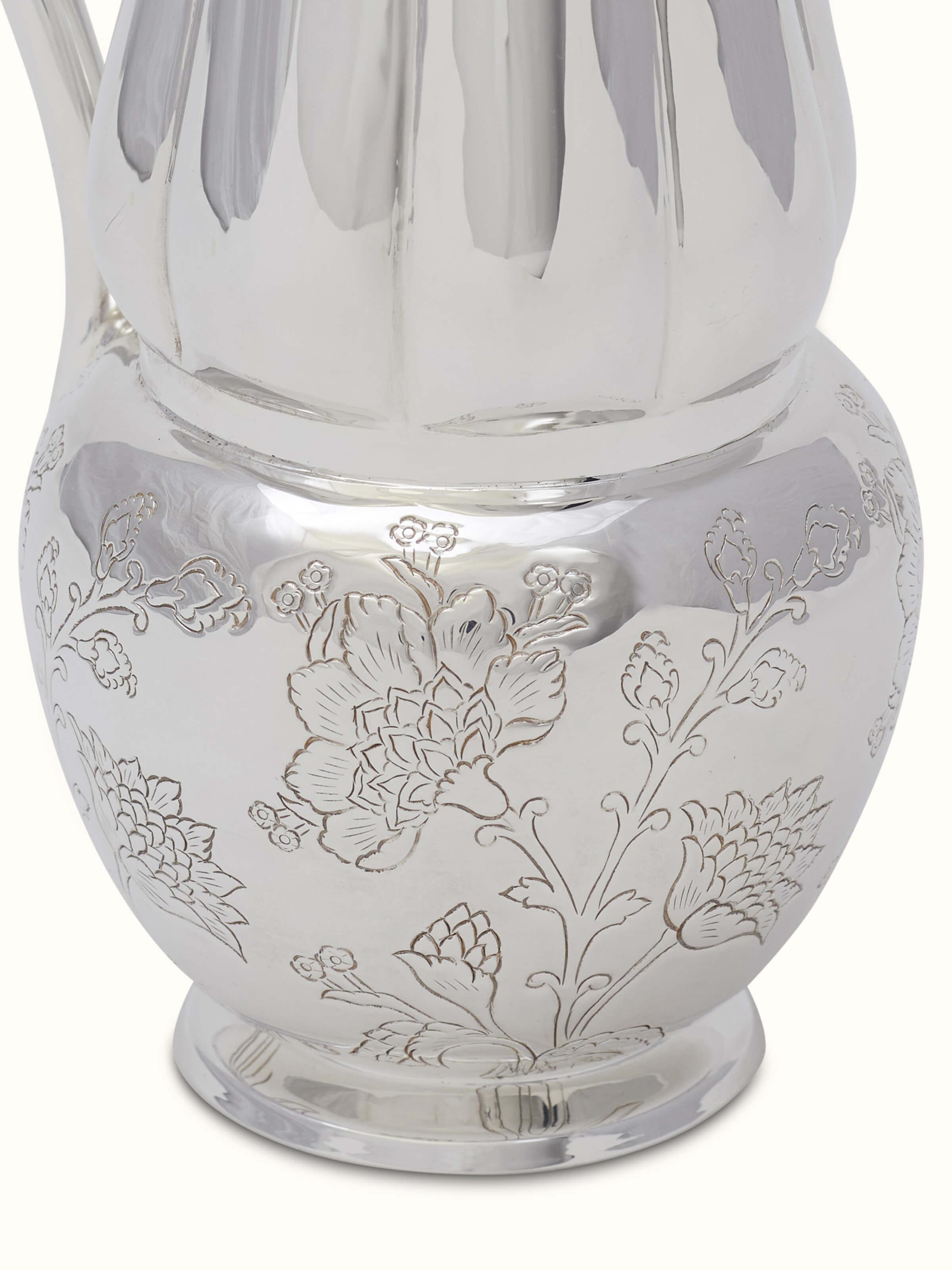 Top view of Kalamkari silver water pitcher displaying its ornate design.