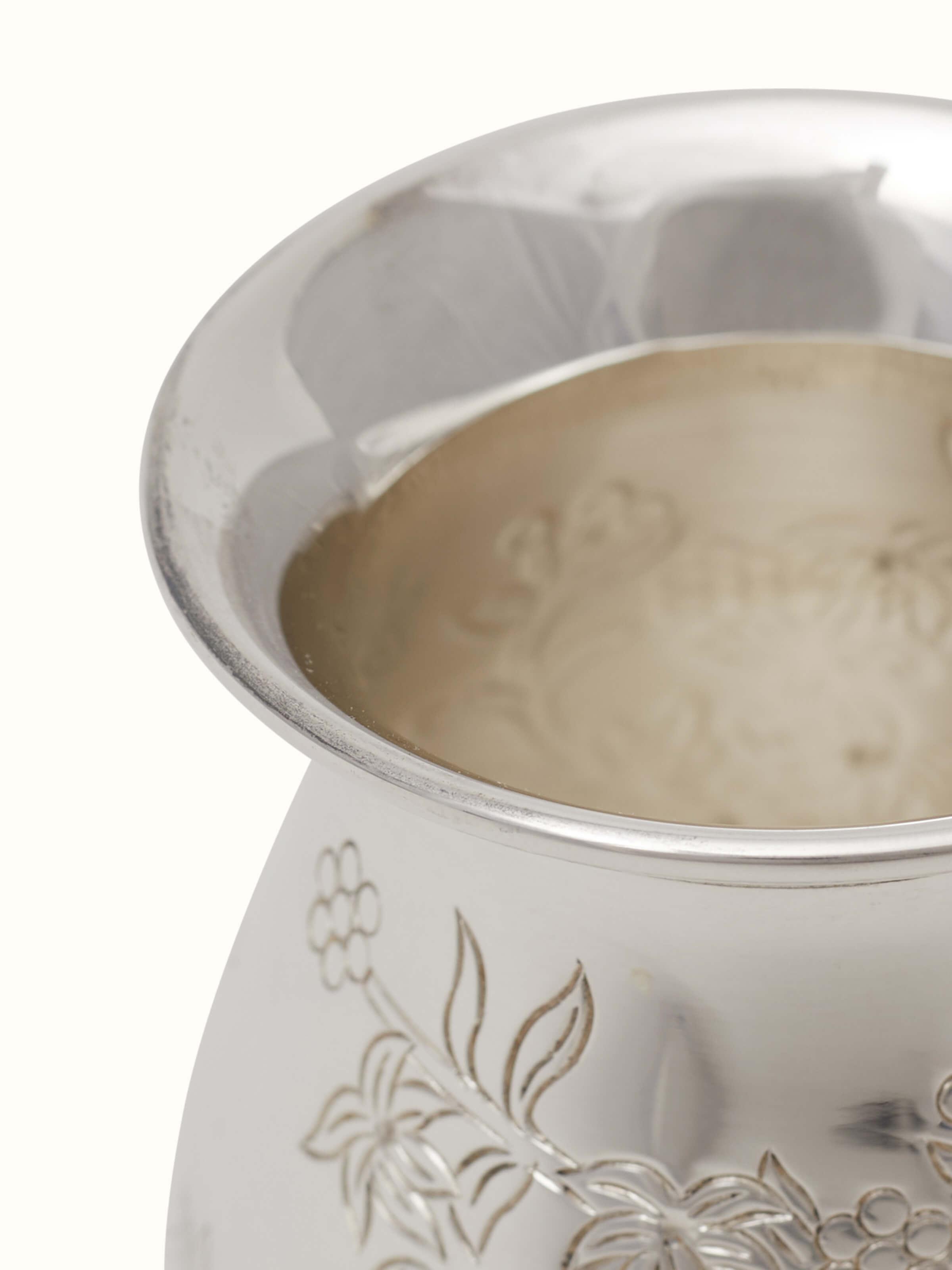 Angled view of Silver Basant Pooja Kalash, demonstrating its elegant shape and reflective finish