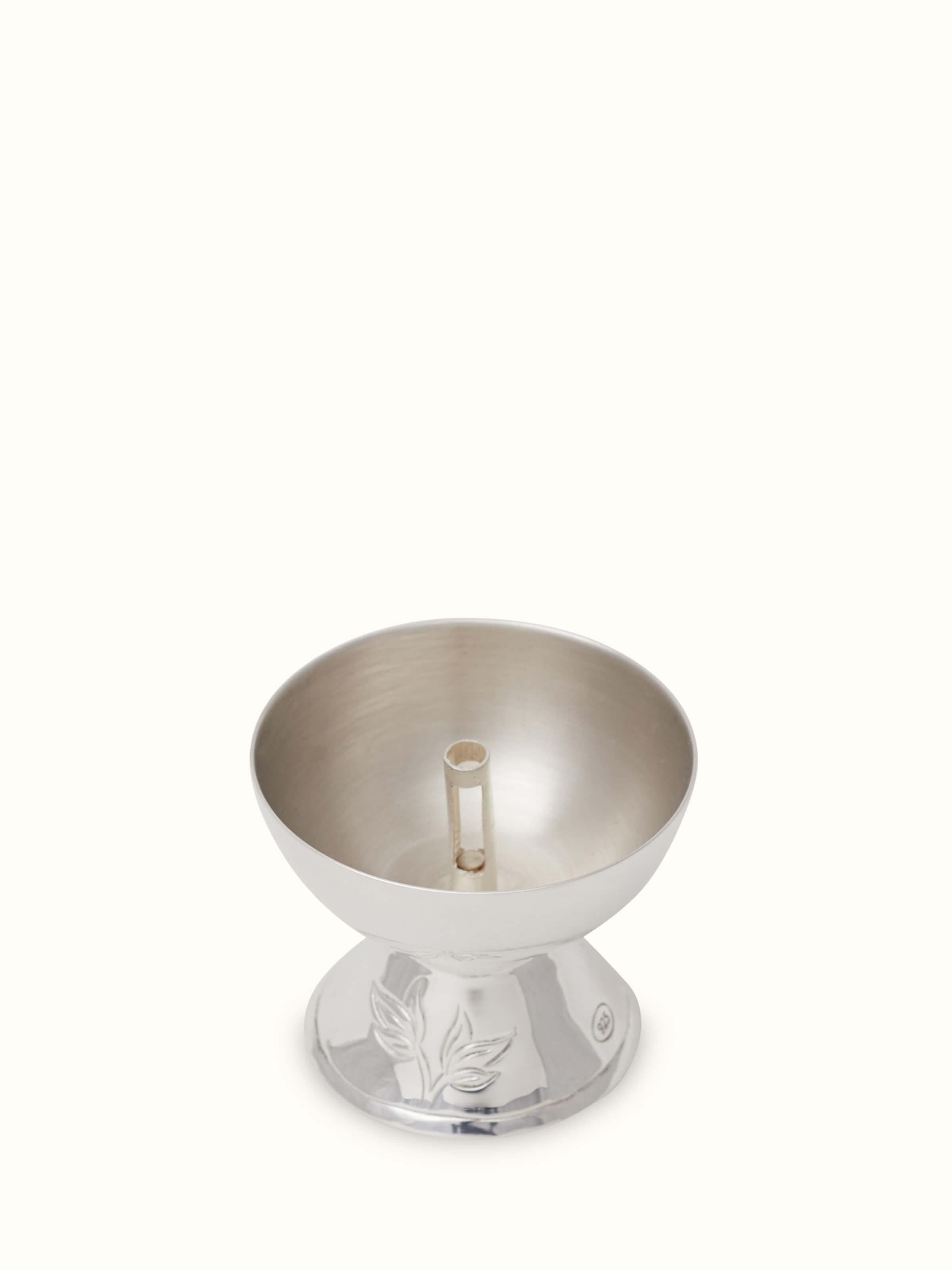 Side view of Silver basant diya showcasing its shine