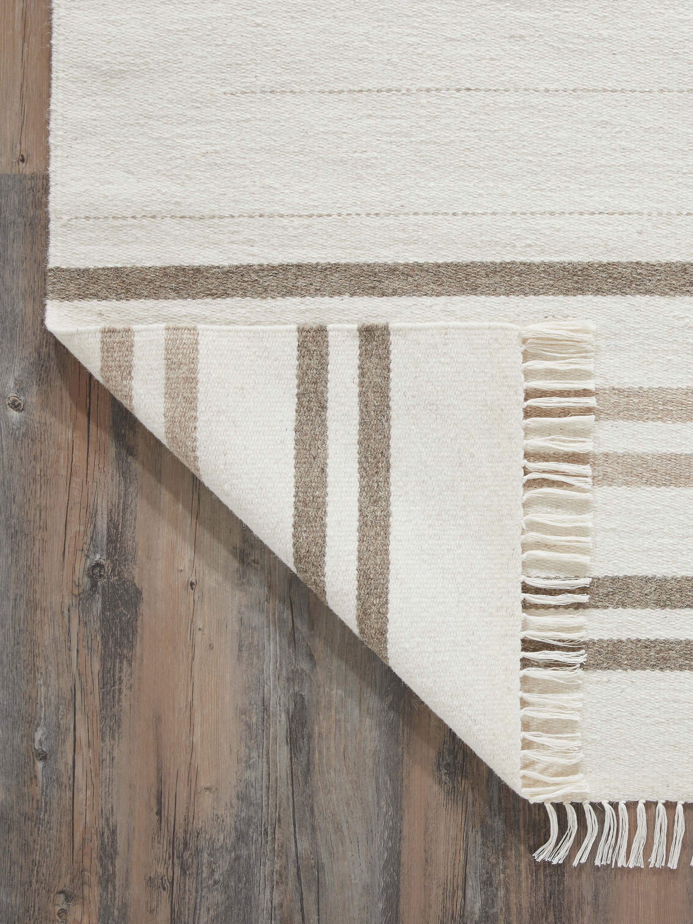 Nomad stripes ivory Jawaja wool & cotton handloom dhurrie, showing a close-up of the stripe details and fabric
