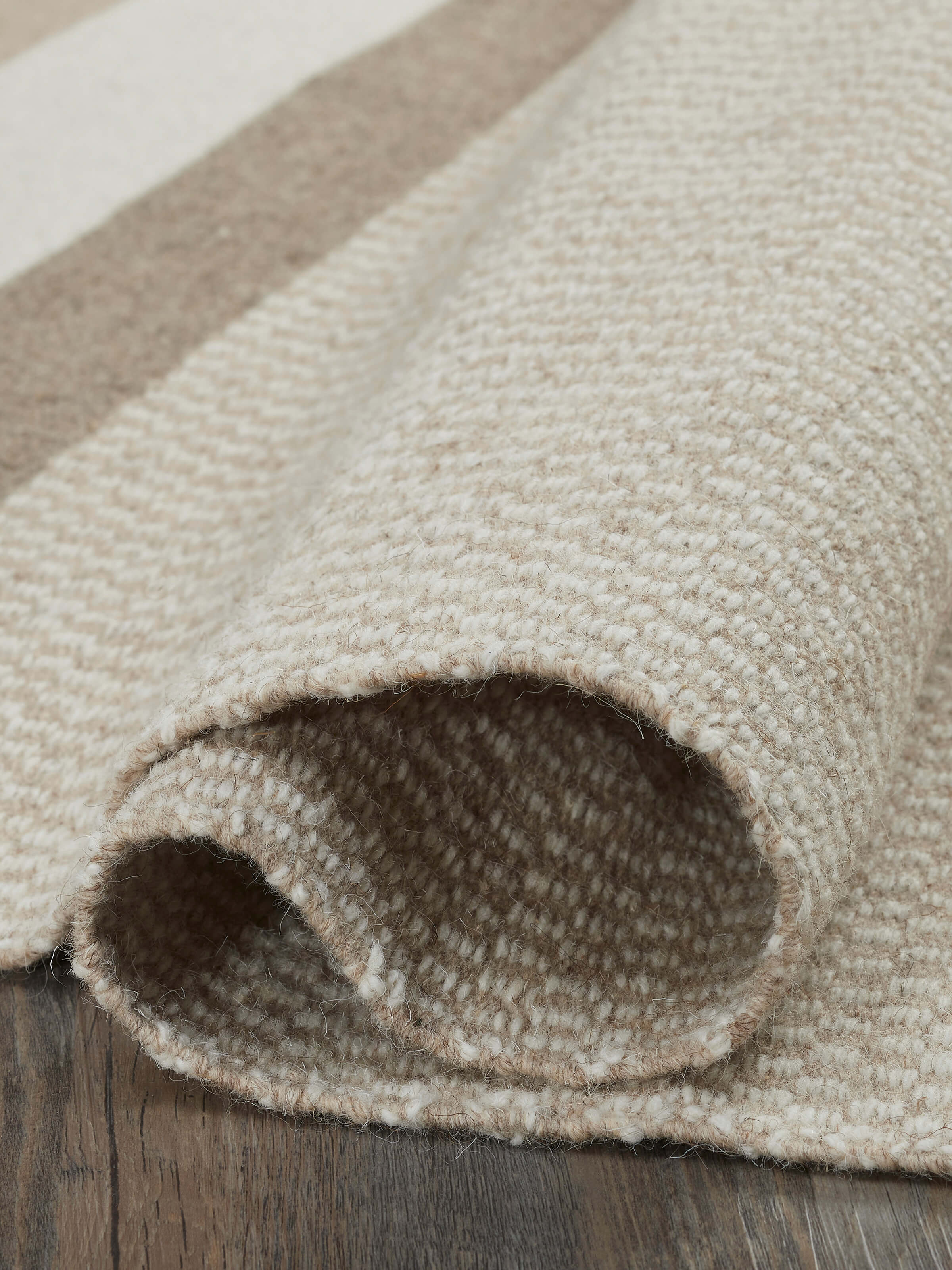 Geo checkered beige Jawaja wool & cotton handloom dhurrie (3x5 ft) displayed in a room setting, showcasing the checkered design and handloom texture.