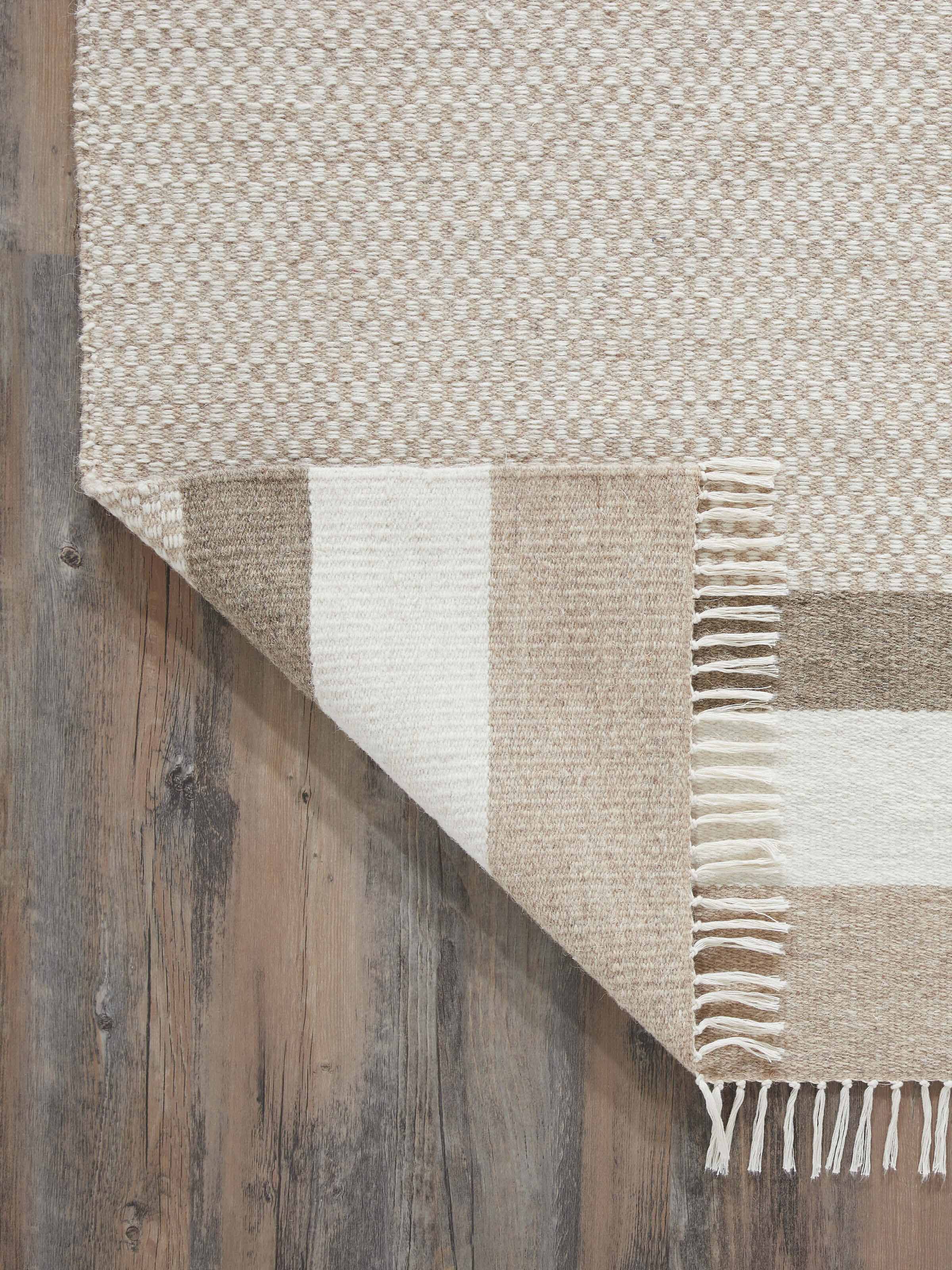 Geo checkered beige Jawaja wool & cotton handloom dhurrie (3x5 ft) highlighting the texture and pattern in a close-up view.