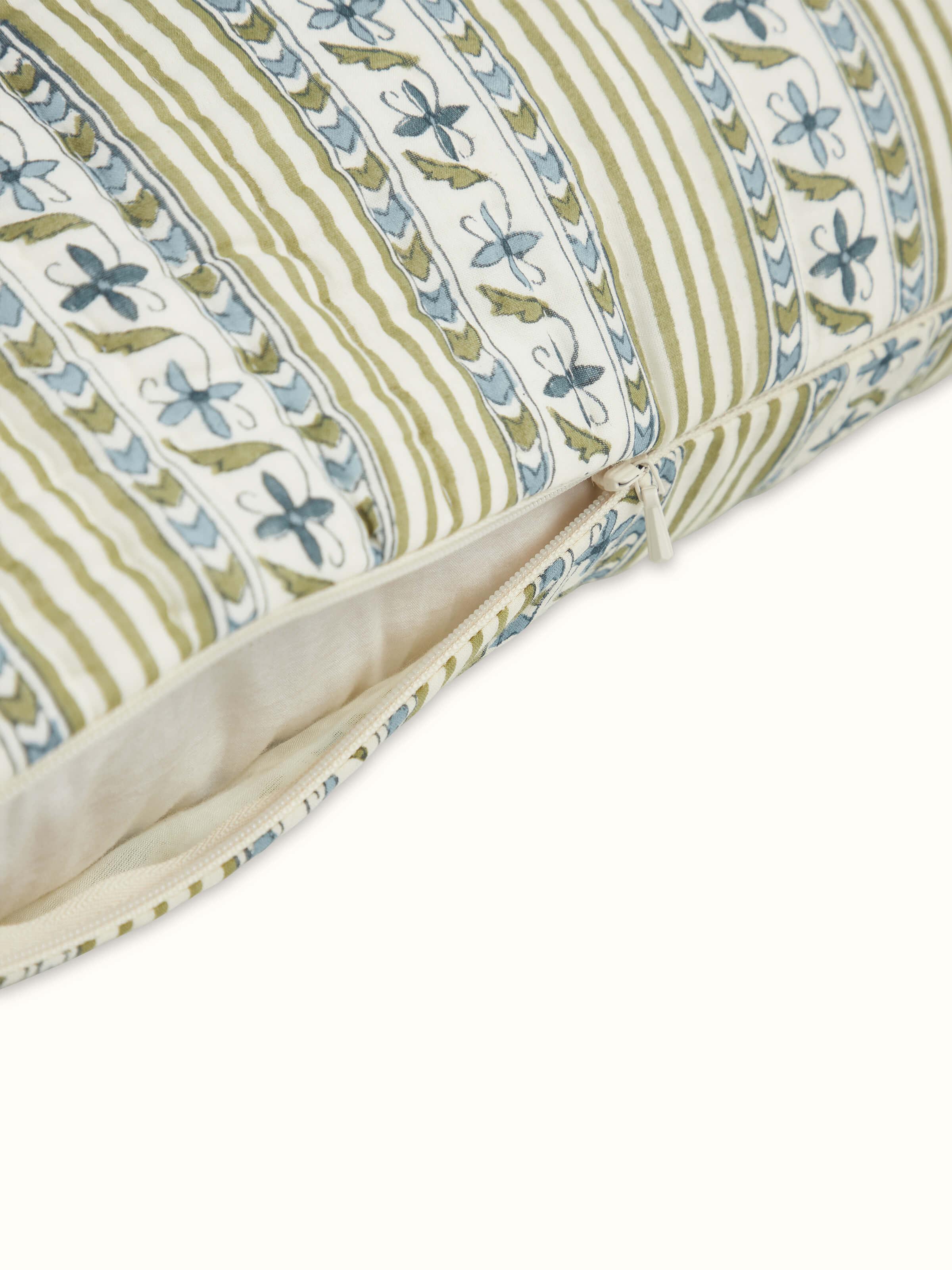 Side view of Aarunya blue floral stripe cotton Sanganeri block printed cushion cover emphasizing the pattern and edge details.