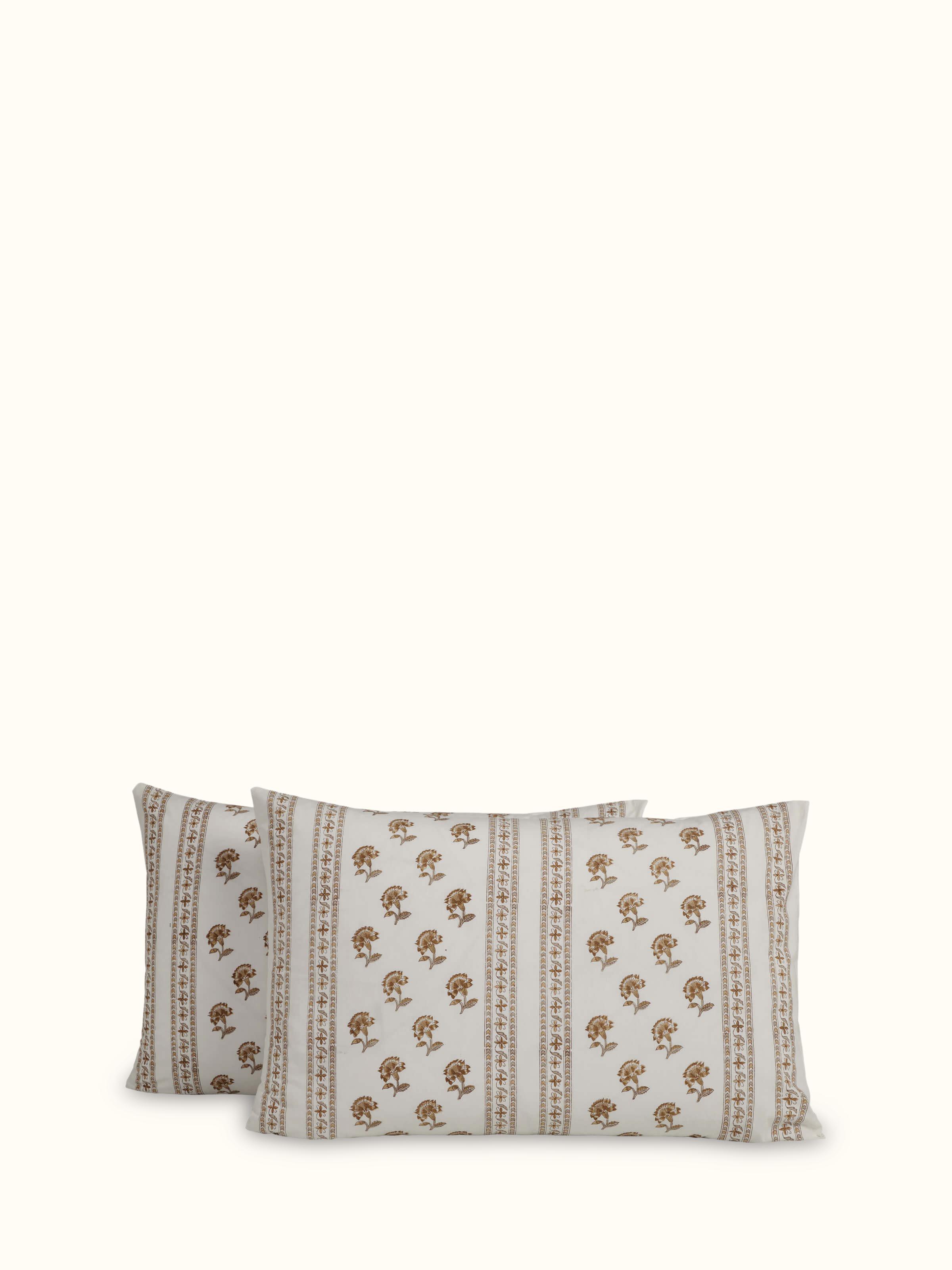 Front view of Aarunya beige buti cotton pillow cases featuring Sanganeri block print design