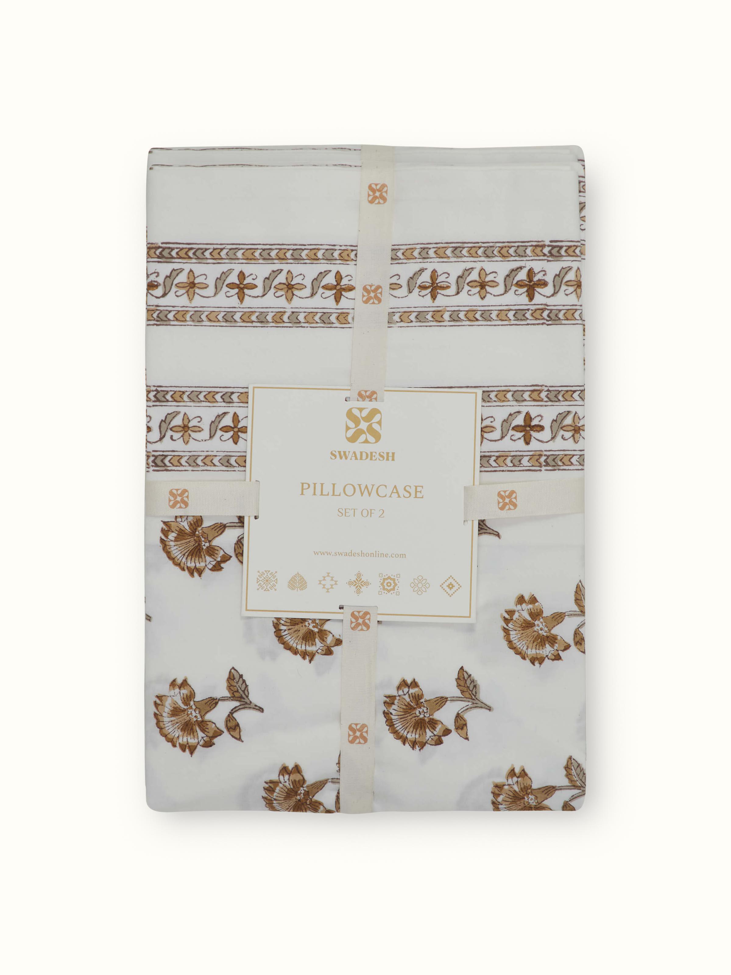 Full view of Aarunya beige buti cotton pillow cases displaying Sanganeri block print pattern and color