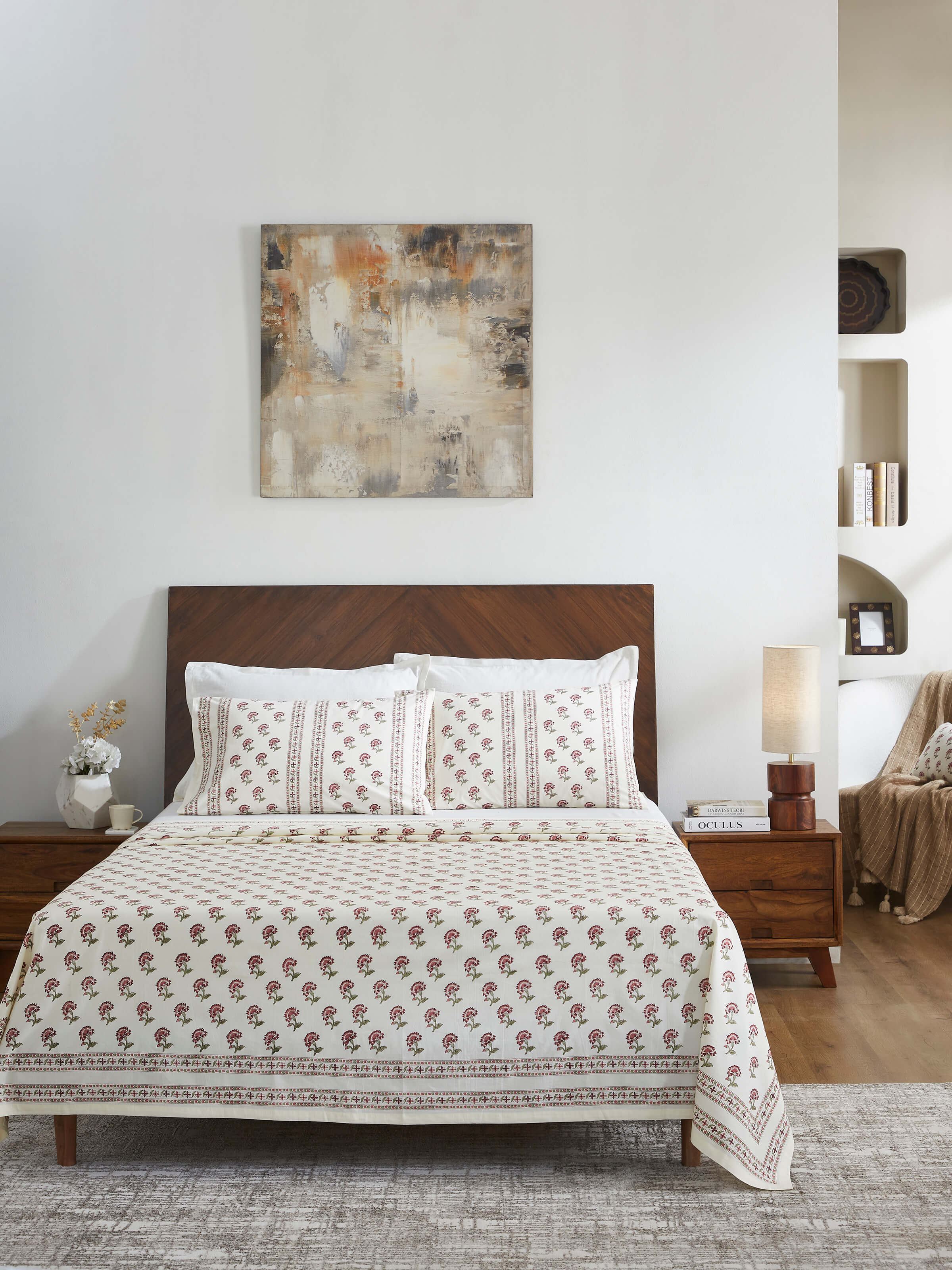 Close-up of Aarunya red buti cotton Sanganeri block printed king bedsheet set (3 pcs) highlighting the detailed block print design and vibrant red color.