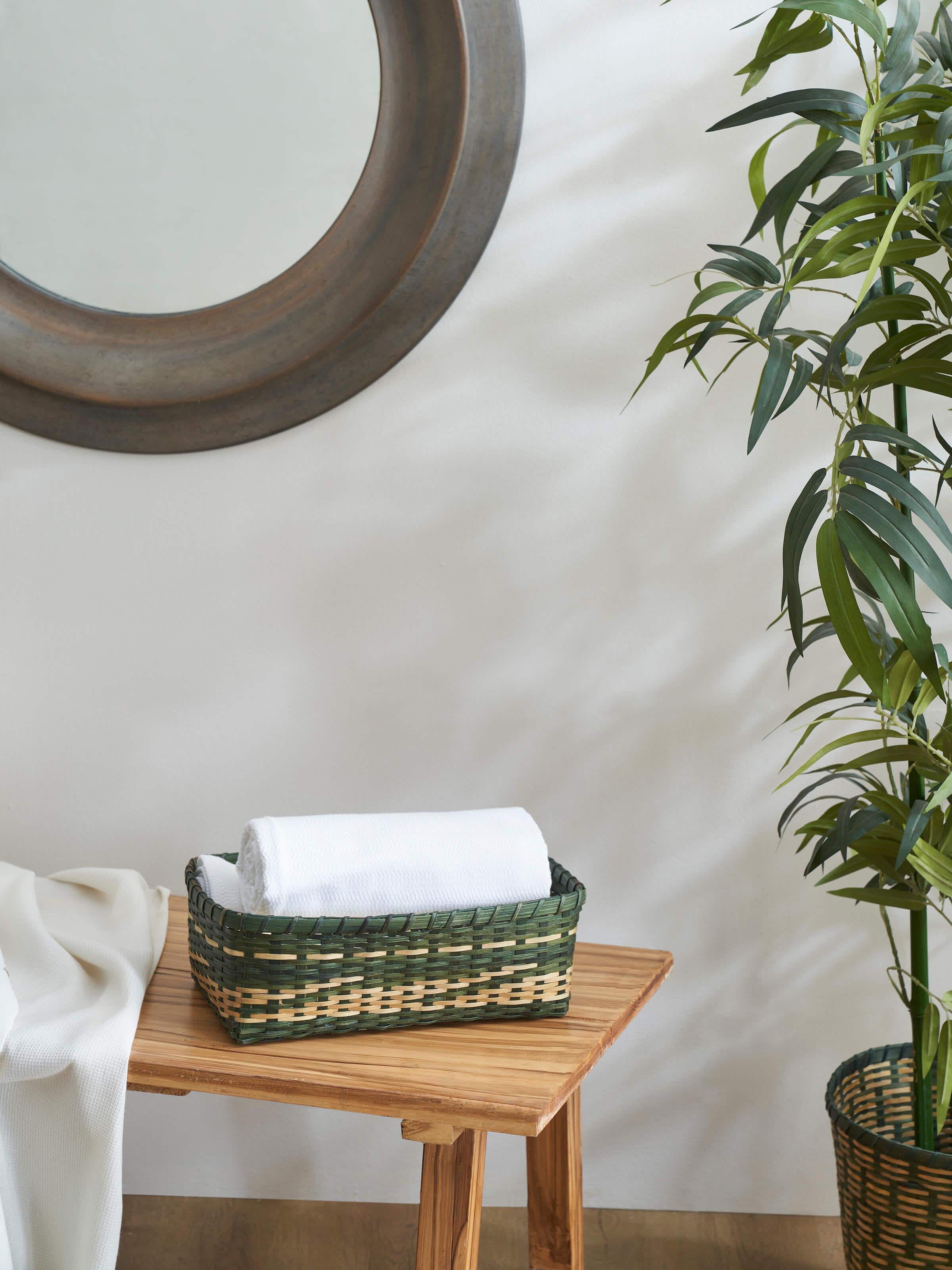 Side view of Bamboo storage organiser in green color highlighting its compact and practical structure