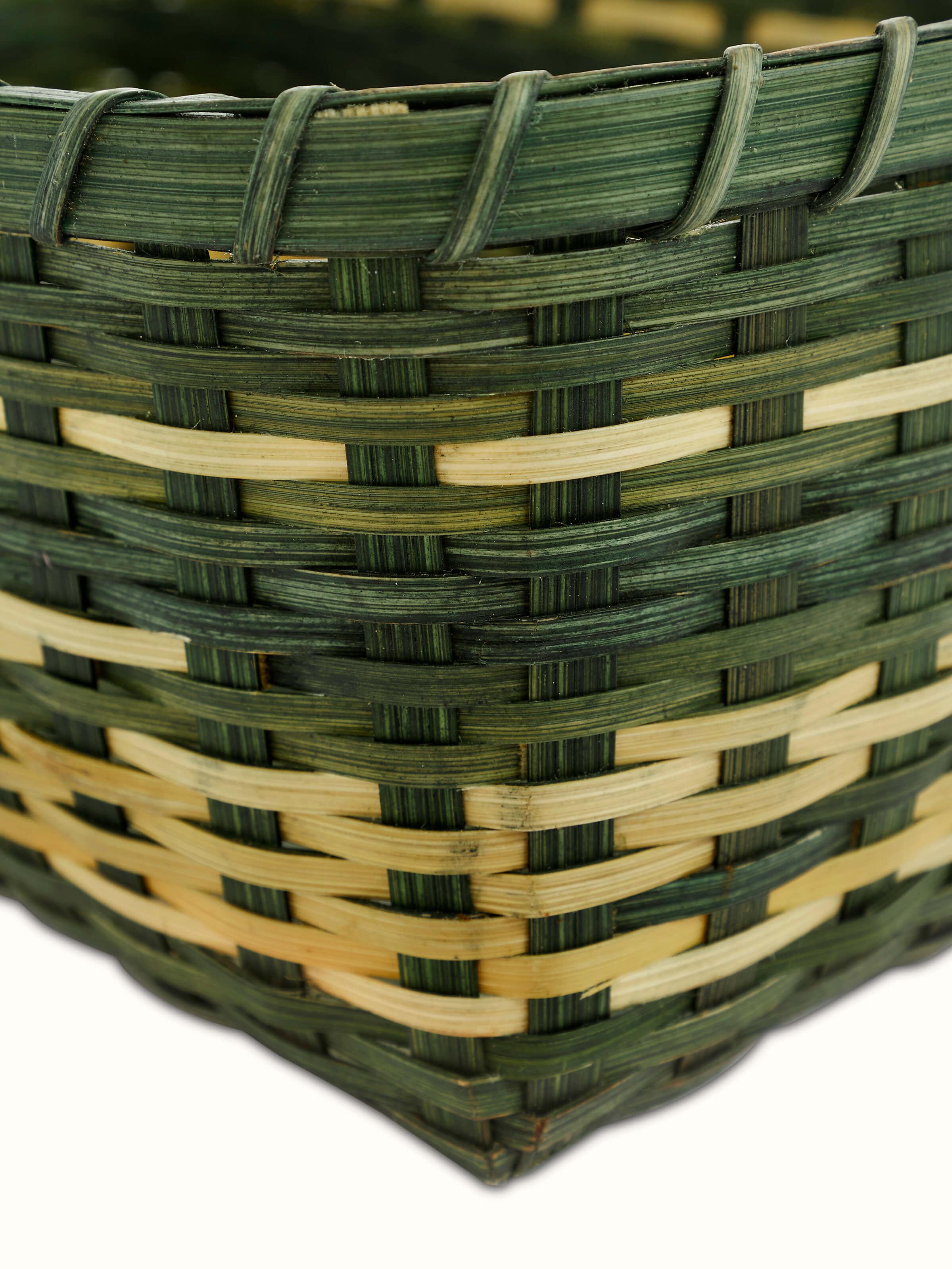Detailed view of Bamboo storage organiser in green color showing texture and finish of bamboo craftsmanship
