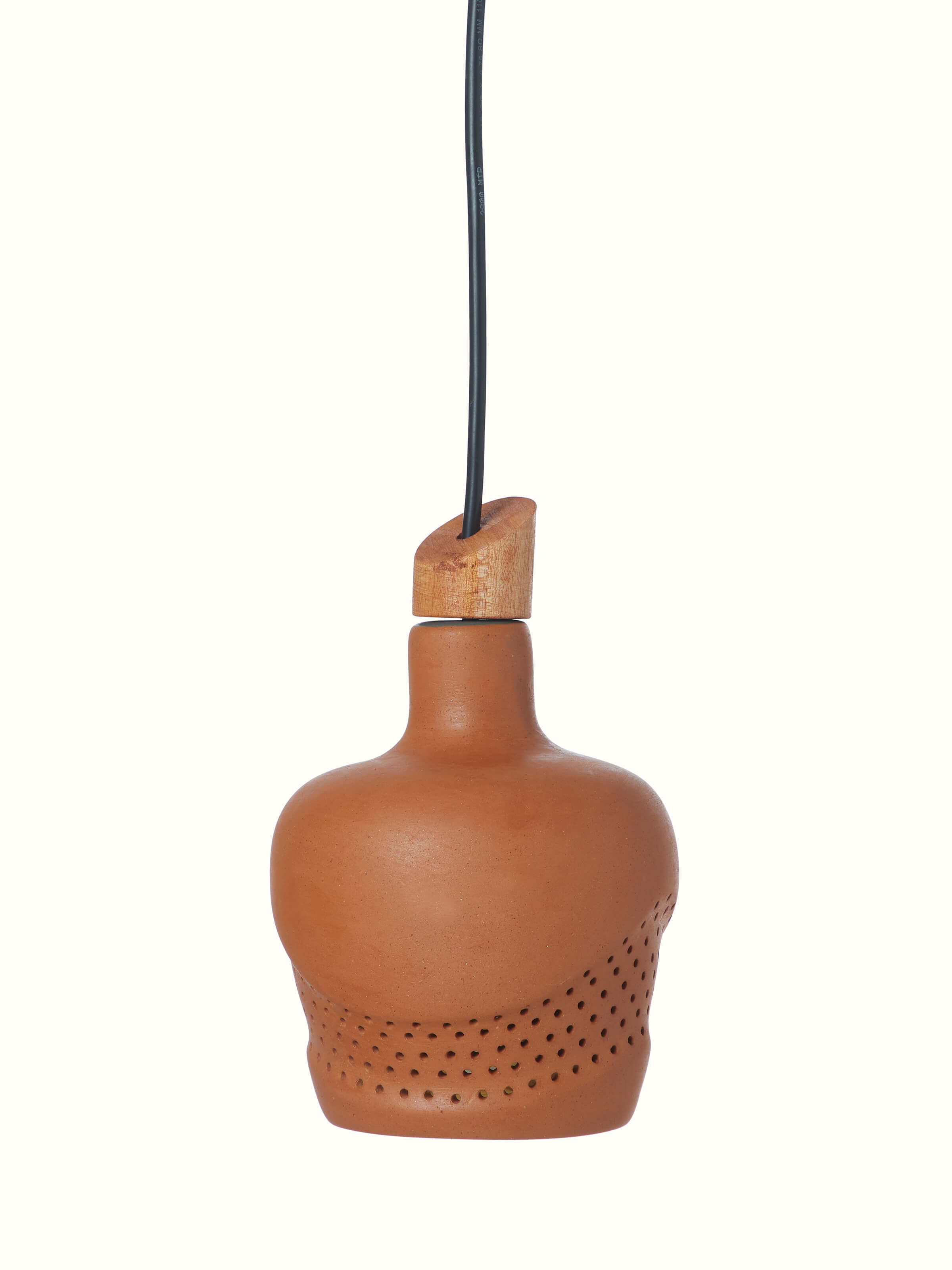 Close-up of terracotta pendant lights, highlighting the intricate texture and design details.