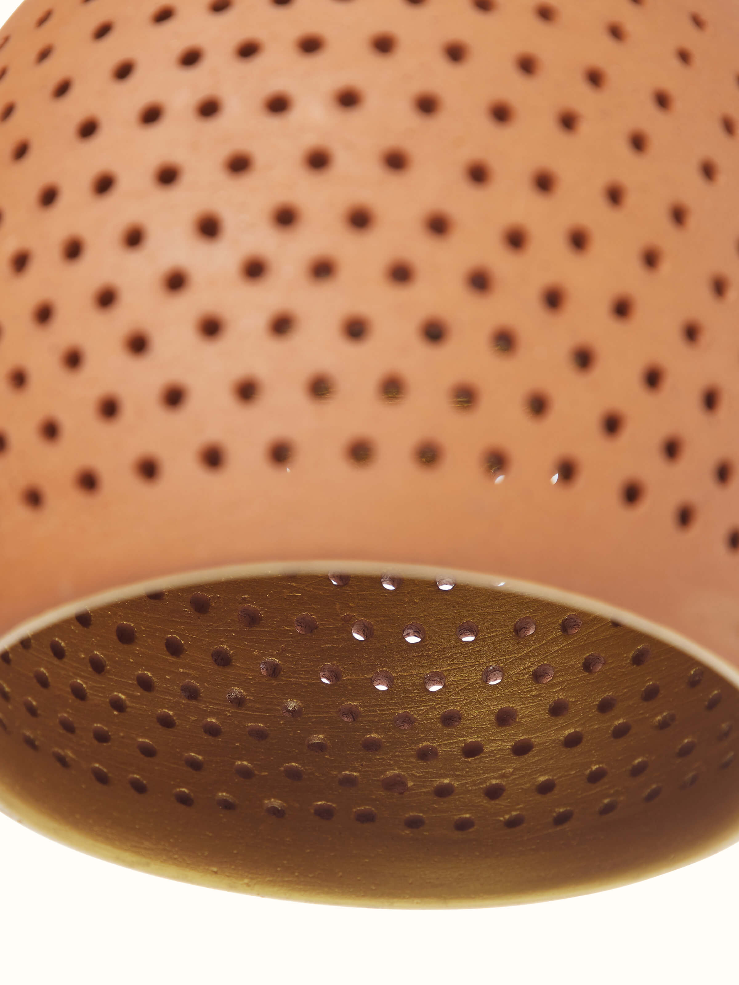 Top view of Natural Terracotta Pendant Lights (Small), highlighting the unique design and lighting effect