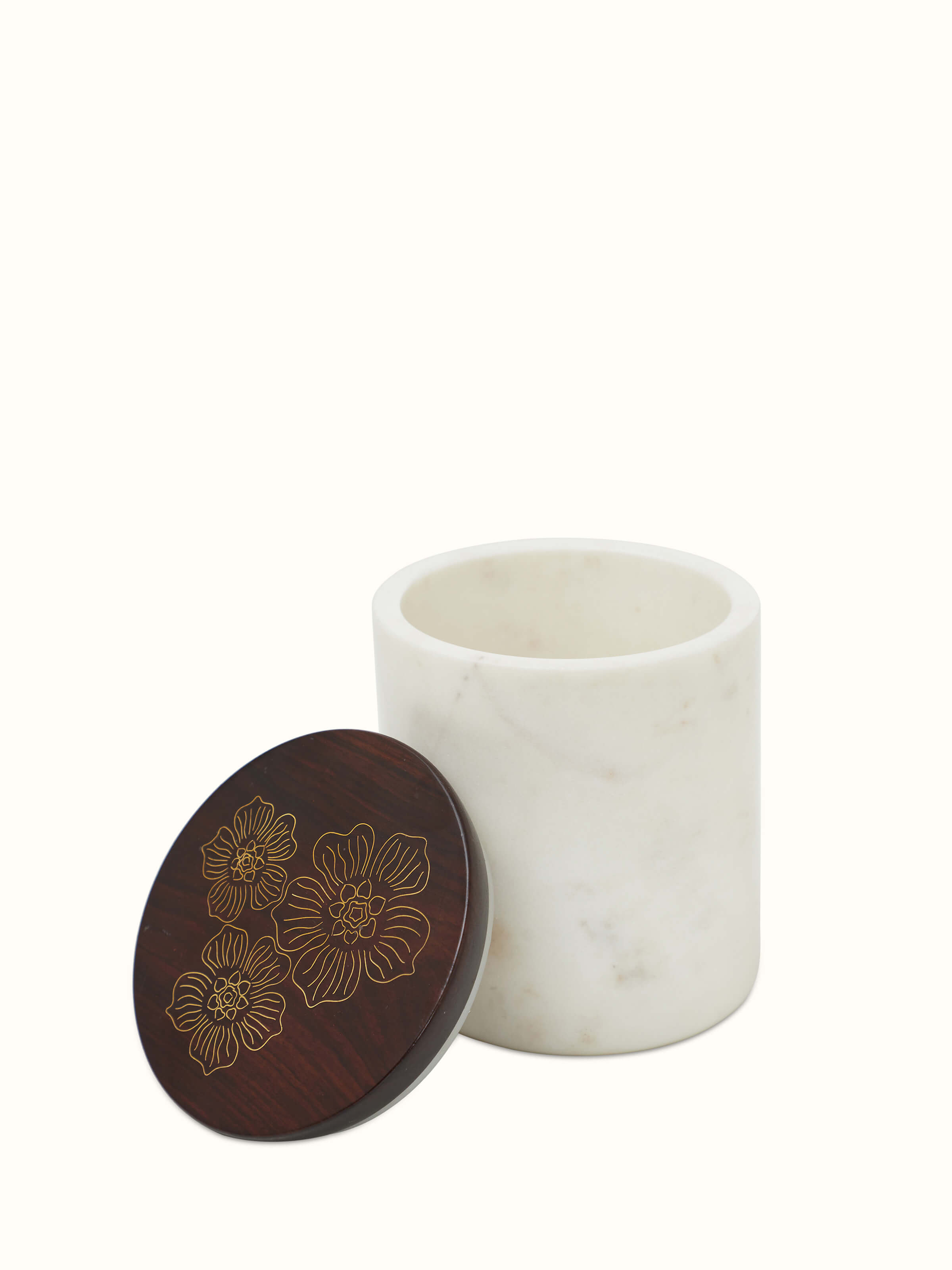 Close-up showing the details of Tarkashi sheesham wood and brass jars, focusing on the intricate patterns and brass detailing.