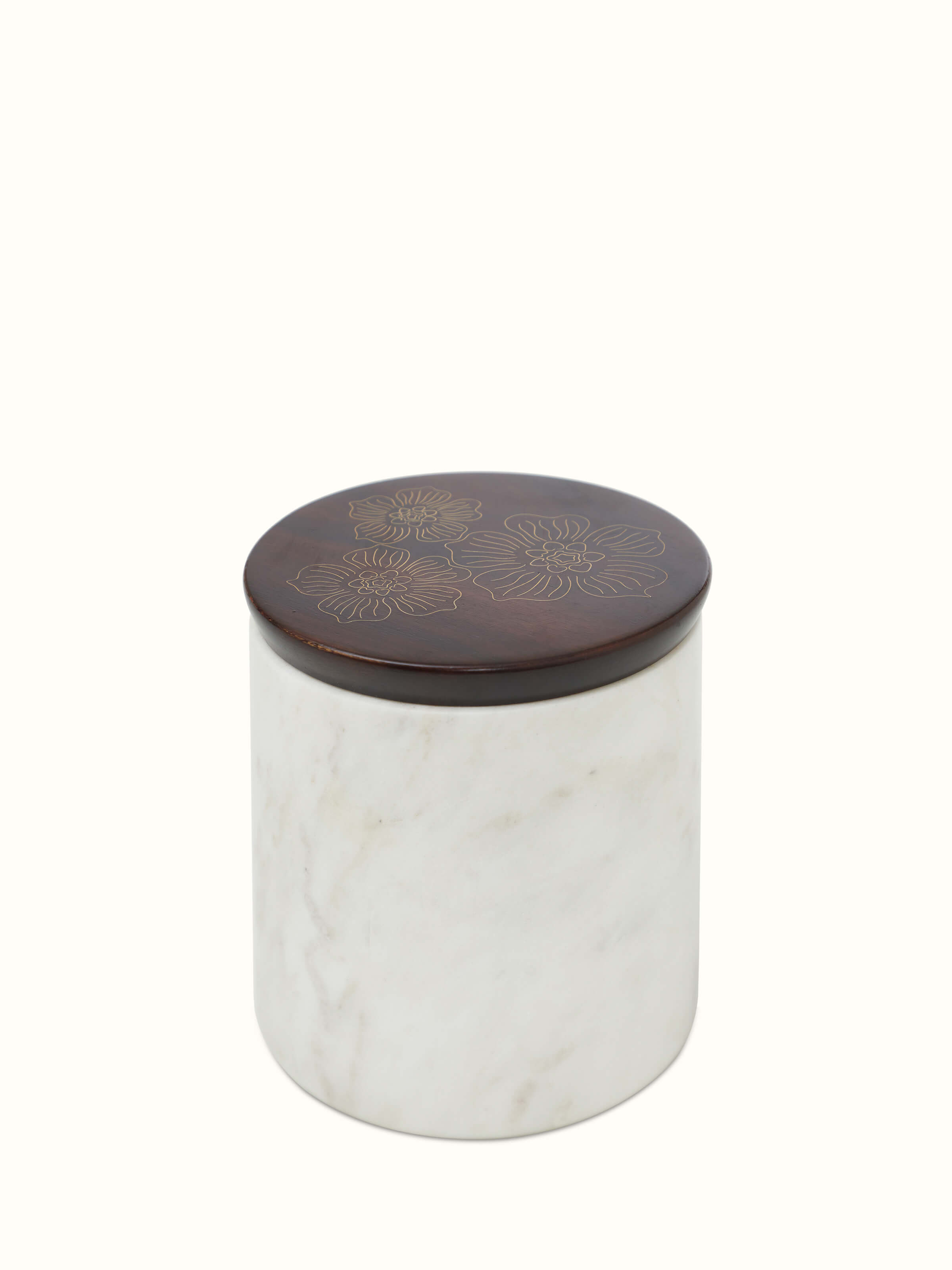 Close-up of Tarkashi sheesham wood and brass jars, showcasing the detailed craftsmanship and rich materials.