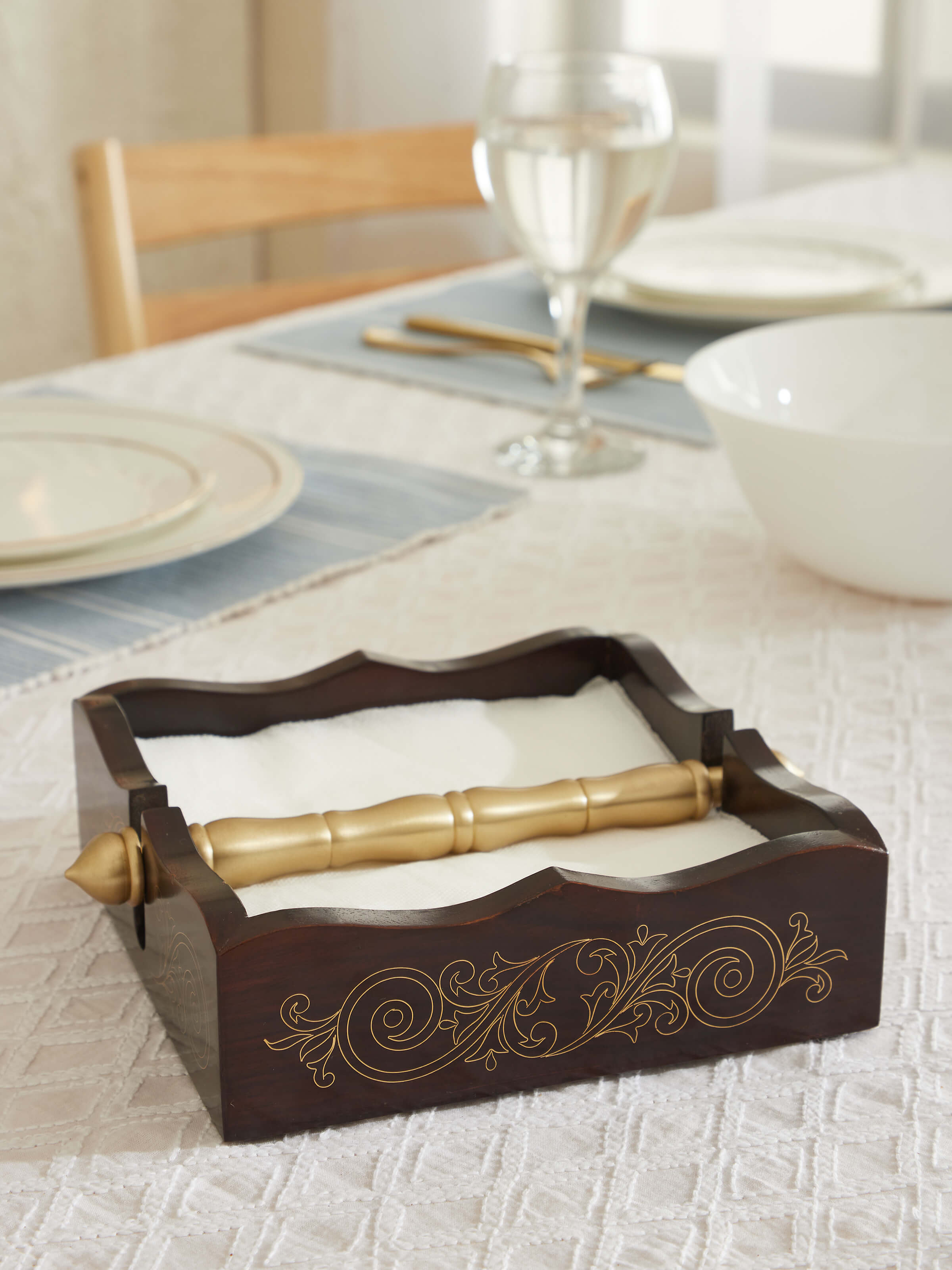 Side view of Tarkashi Sheesham wood & brass napkin holder emphasizing the detailed brass inlays and wooden craftsmanship