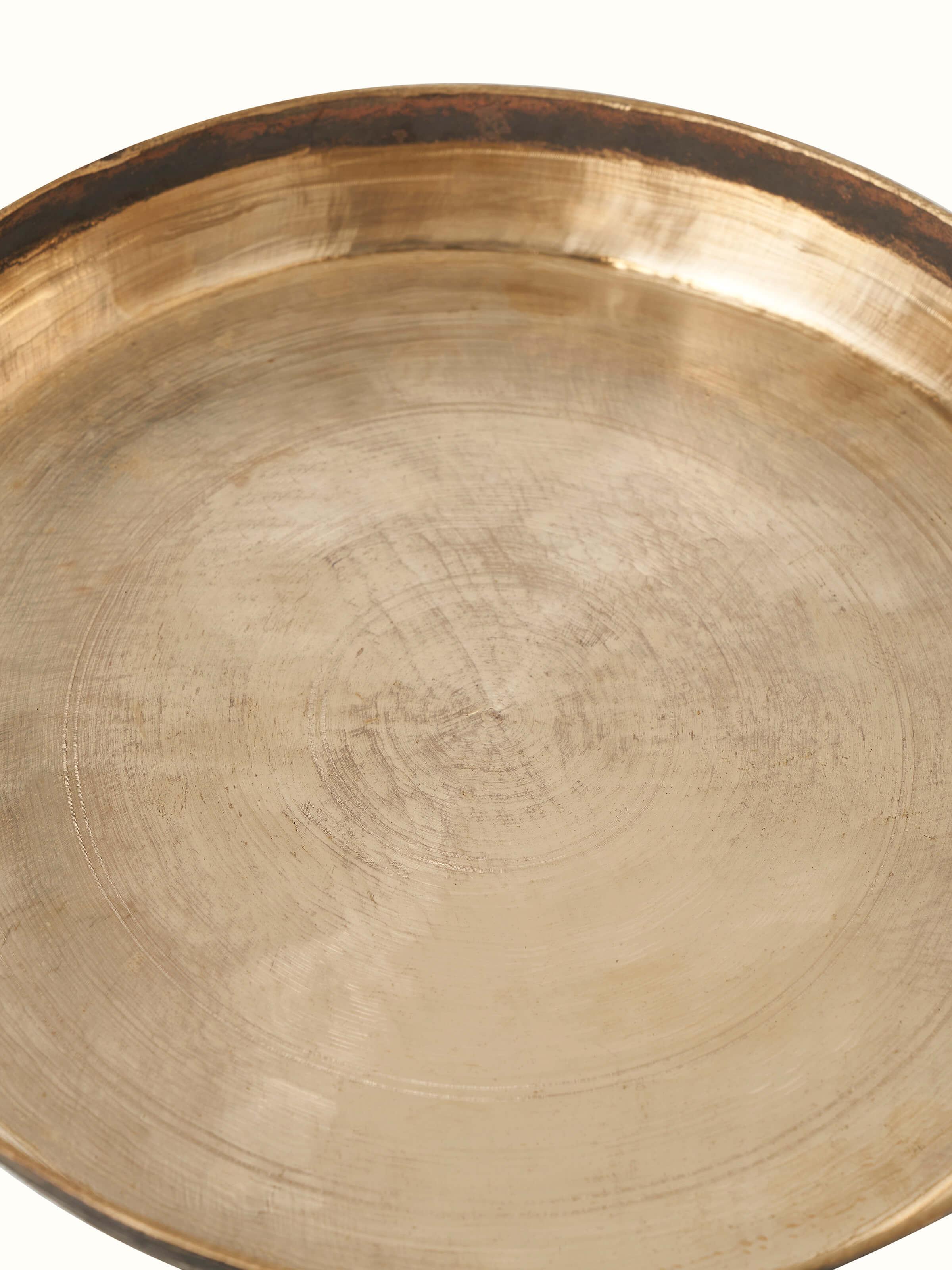 Close-up view of Bell Metal Dinner Plate (11 inches) displaying fine detailing and high polish.