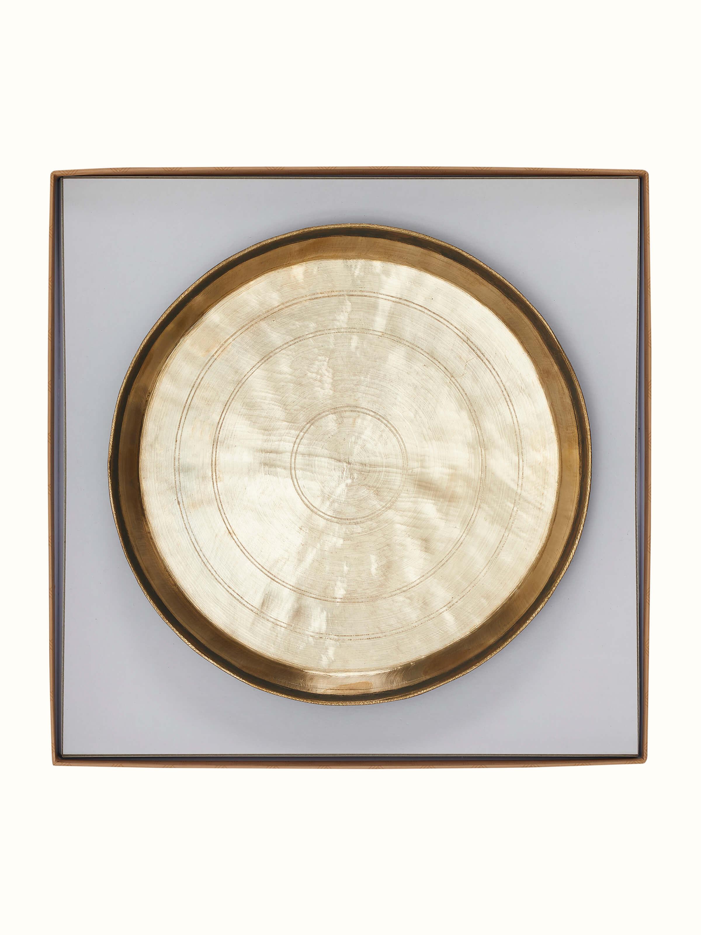 Close-up view of Bell Metal Dinner Plate (11 inches) emphasizing its smooth finish and detailed design.