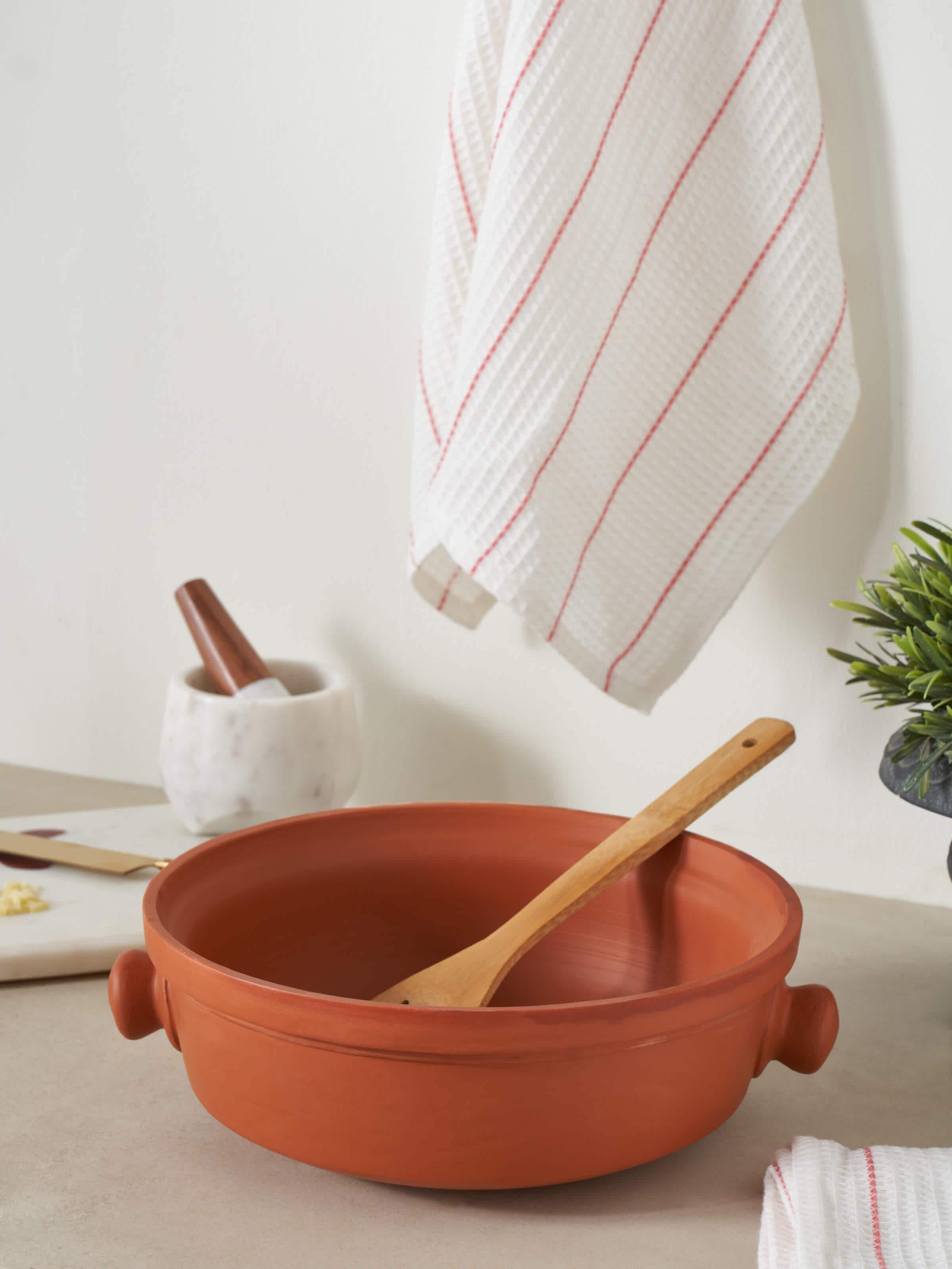 Side view of Terracotta Clay Kadhai highlighting the deep, rounded design perfect for cooking.