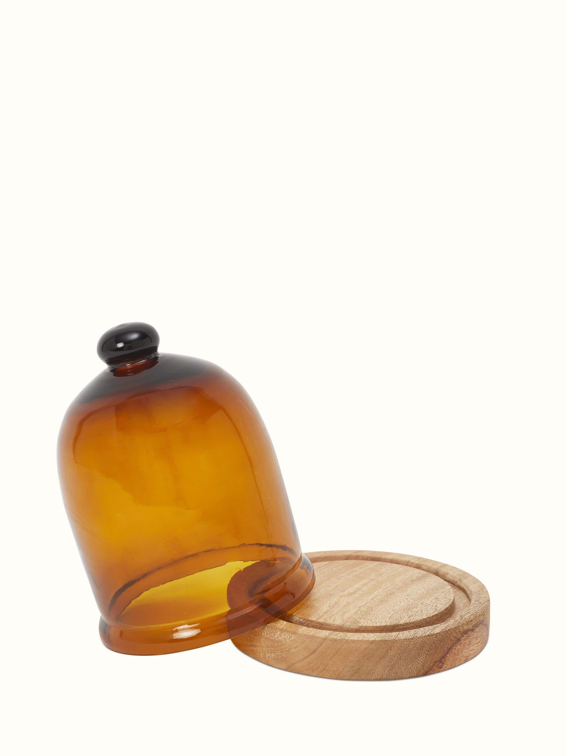 Side view of Glass Cloche, showcasing the dome shape and smooth surface of the glass