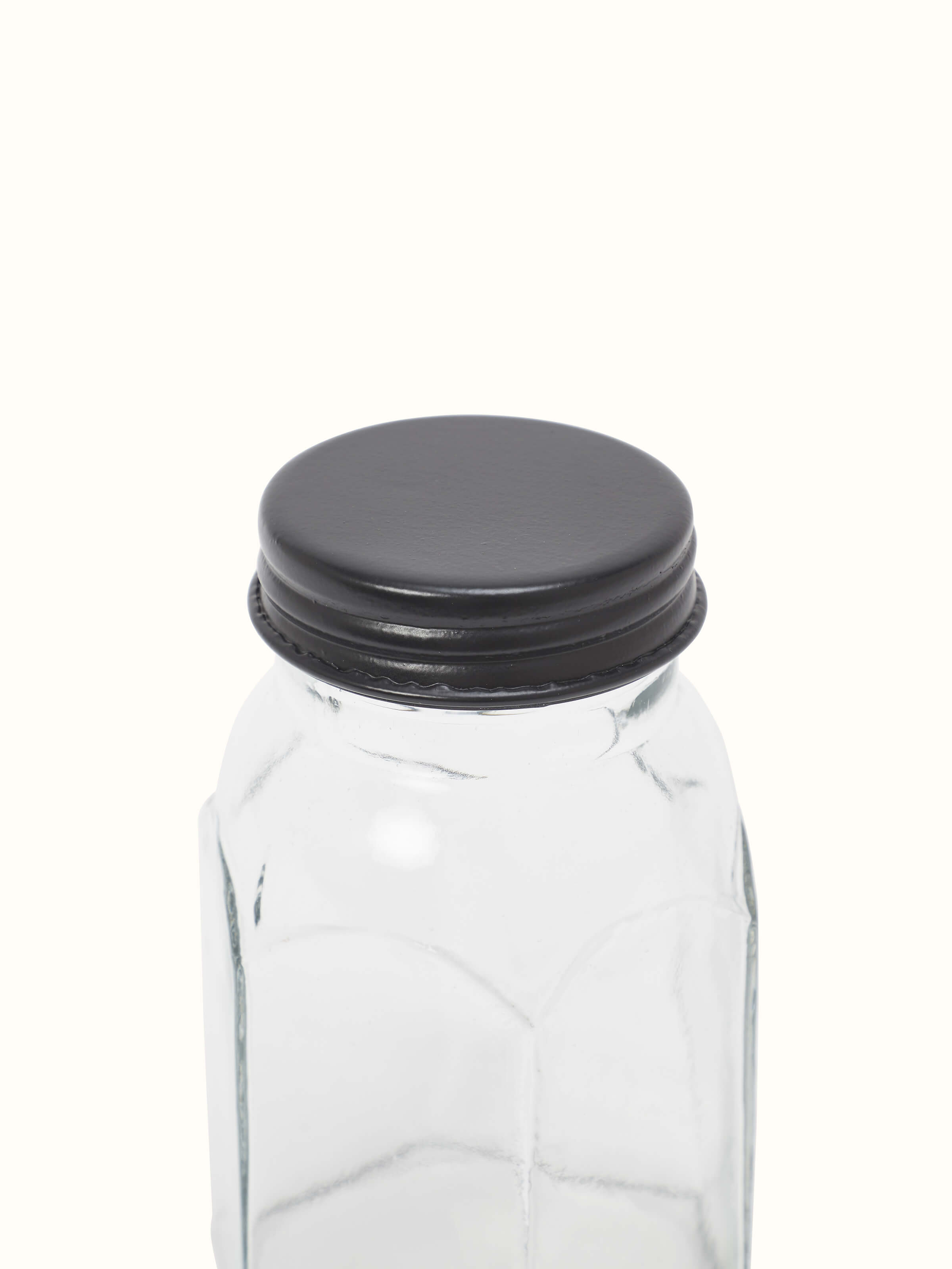 Top view of Firozabadi glass work jar with grey lid showcasing lid and jar details