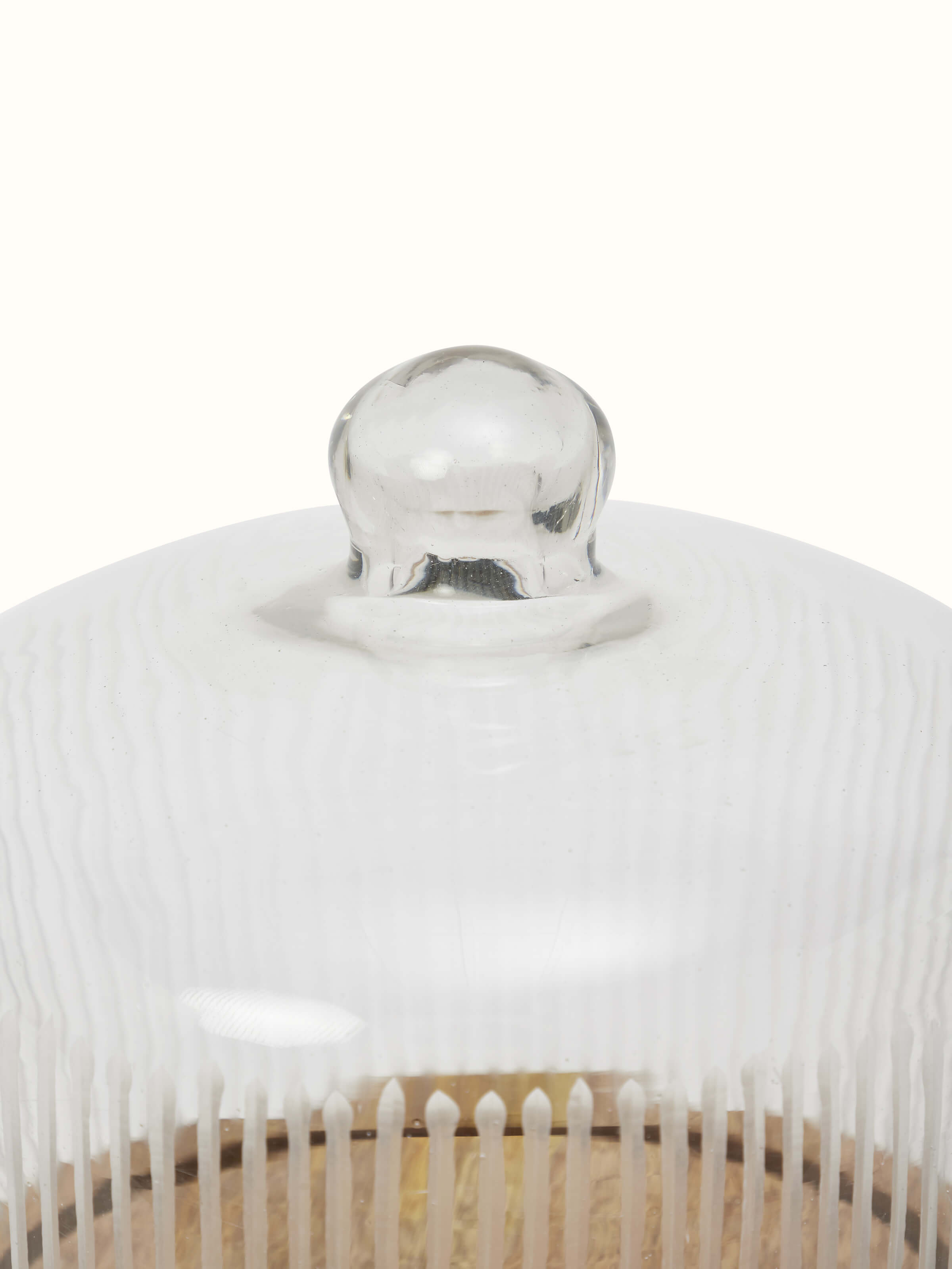 Angled view of glass-worked bell jar, emphasizing its stylish design and pristine finish.