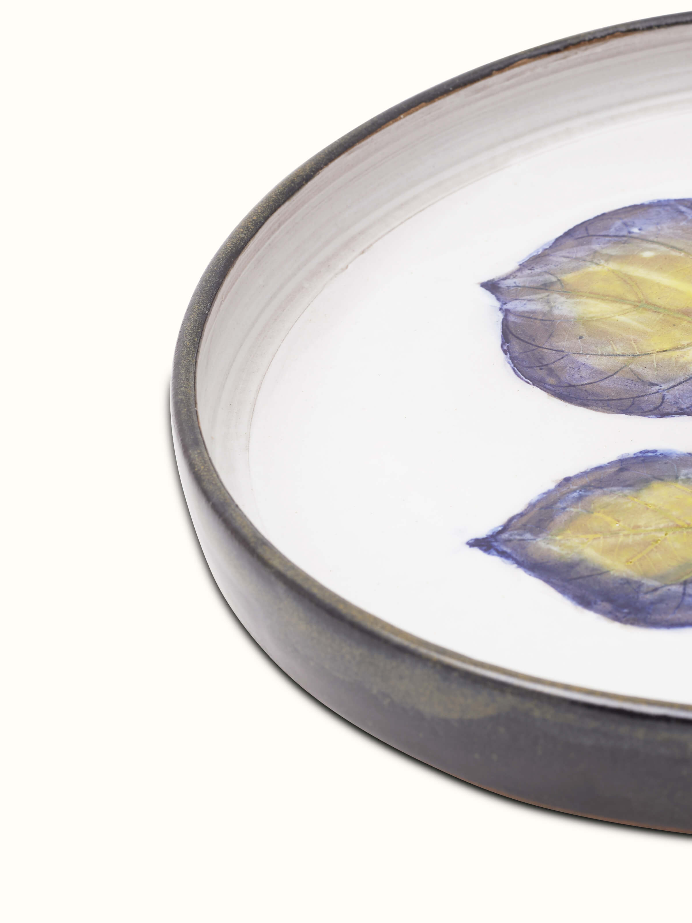 Overview of Glazed studio pottery ceramic dinner plate highlighting the ceramic craftsmanship