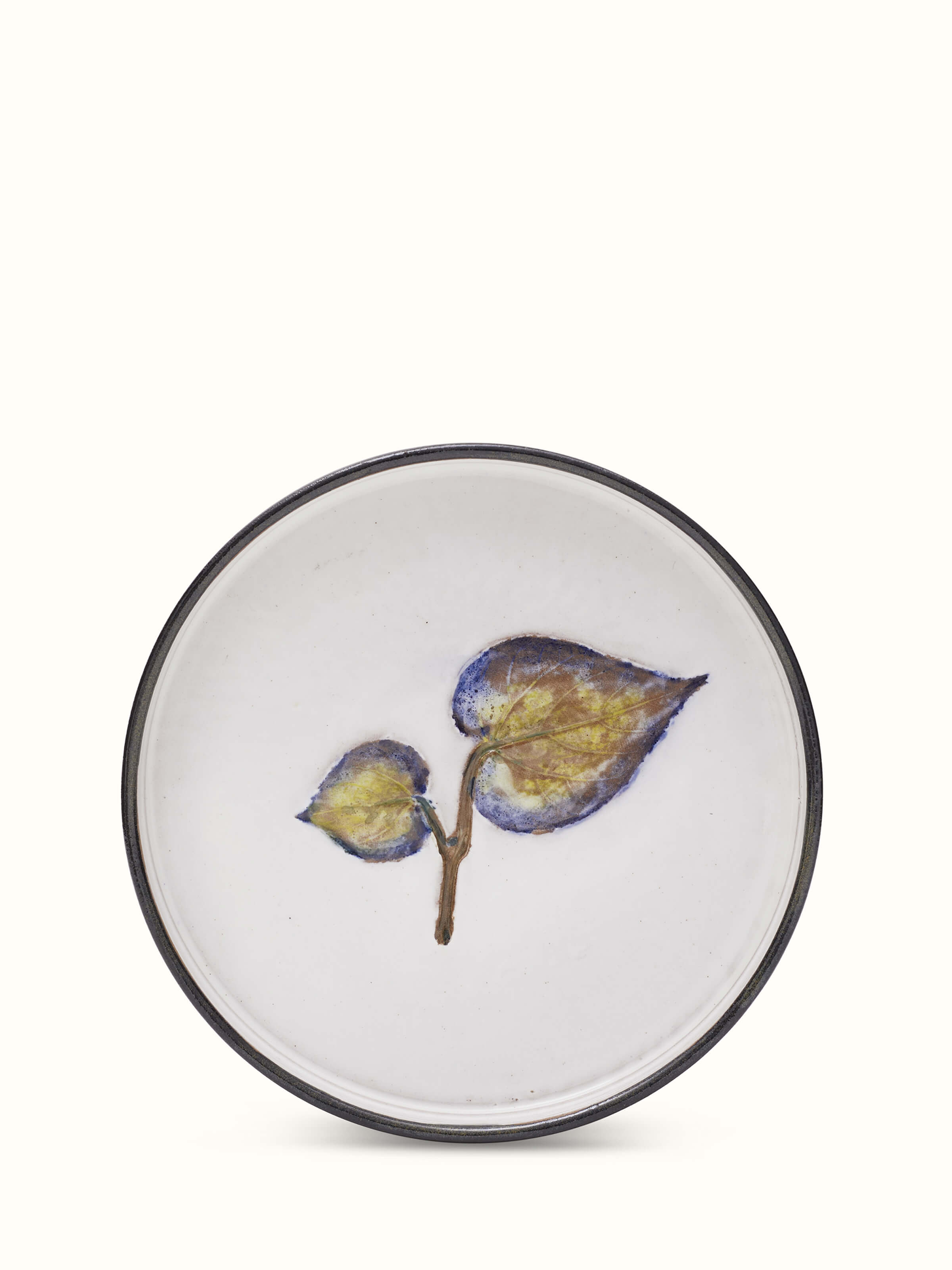 Front view of studio pottery ceramic dessert plate showcasing its artisanal design