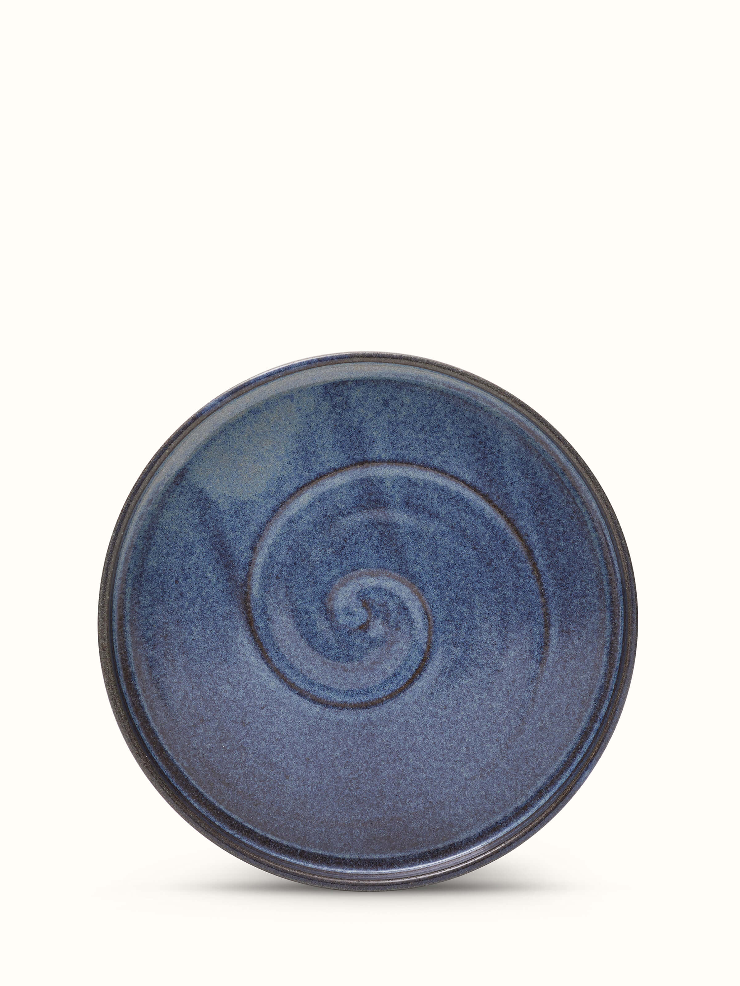 Front view of studio pottery ceramic blue dessert plate, showcasing its elegant glaze and handcrafted design