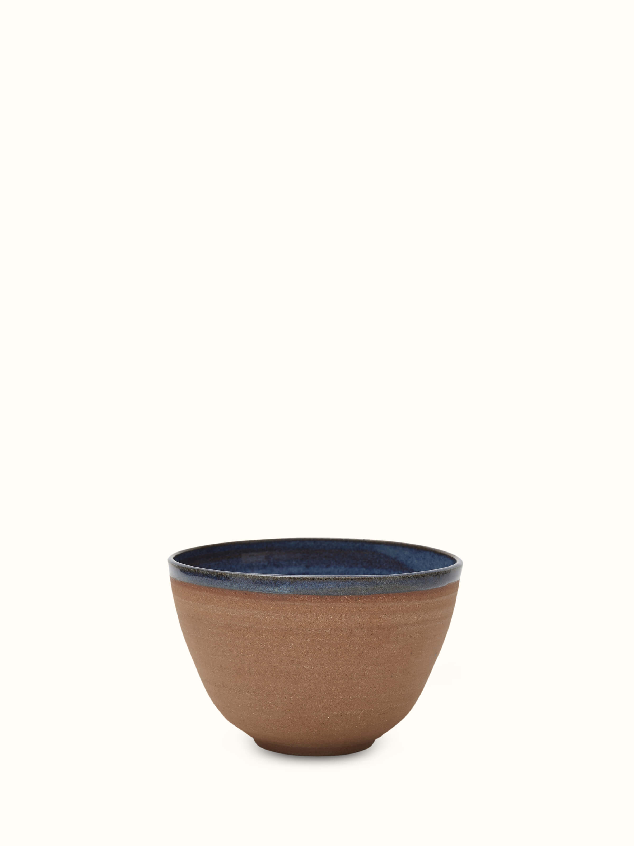 Front view of Studio pottery ceramic serving bowl in brown