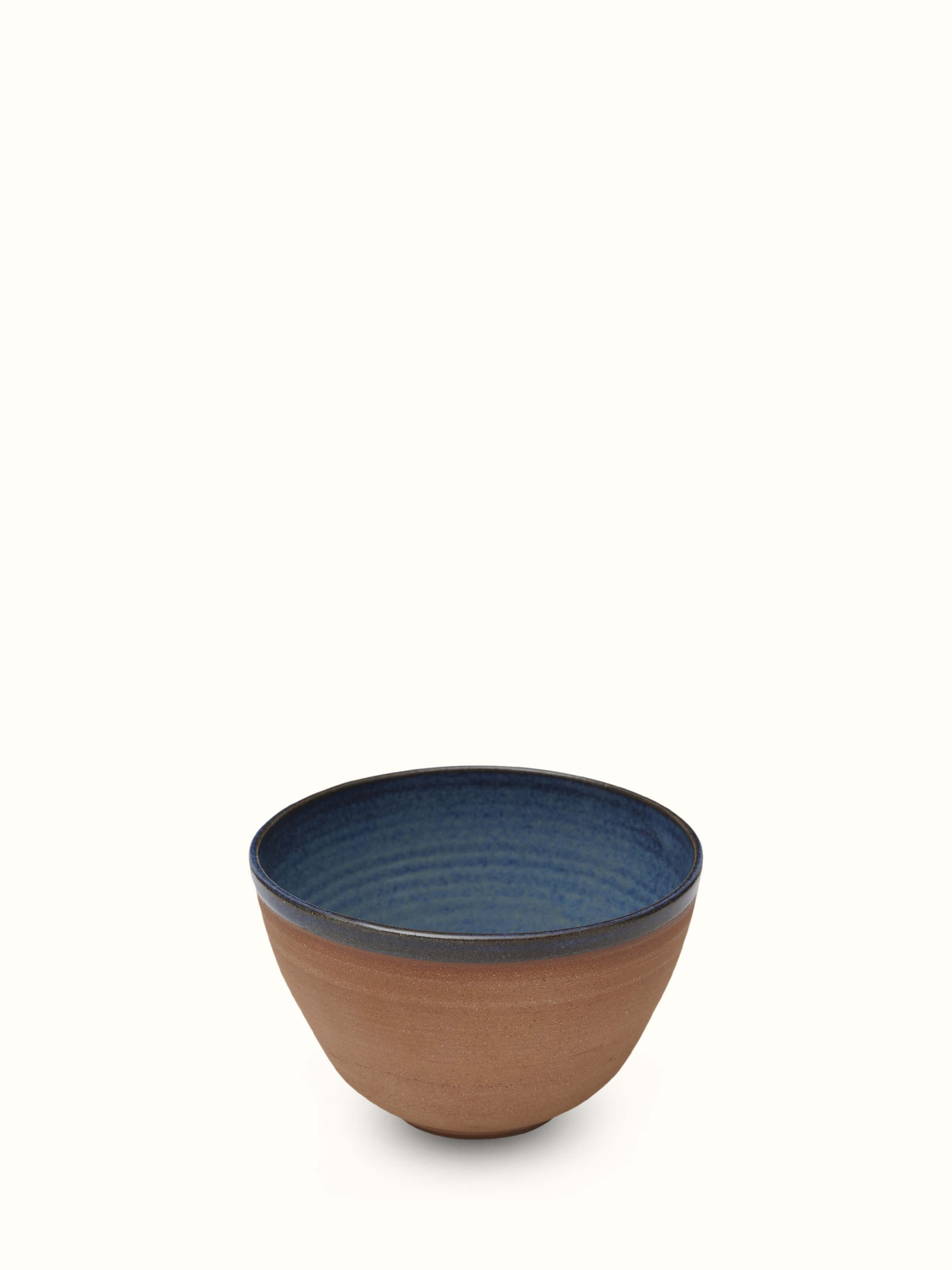 Angle view of Studio pottery ceramic serving bowl in brown