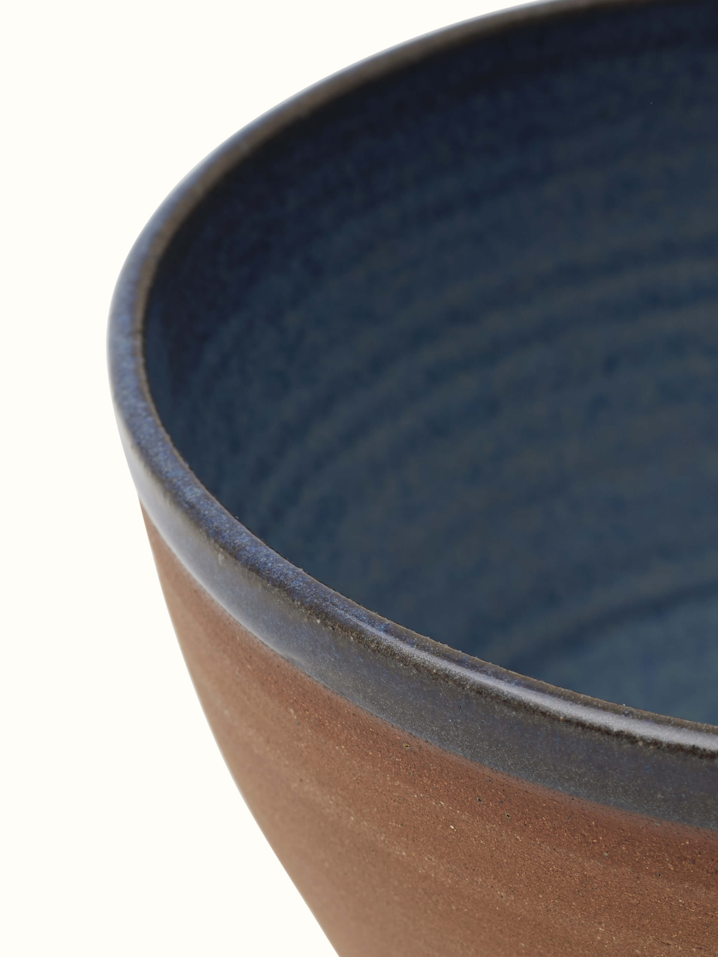 Detailed view of Studio pottery ceramic serving bowl in brown